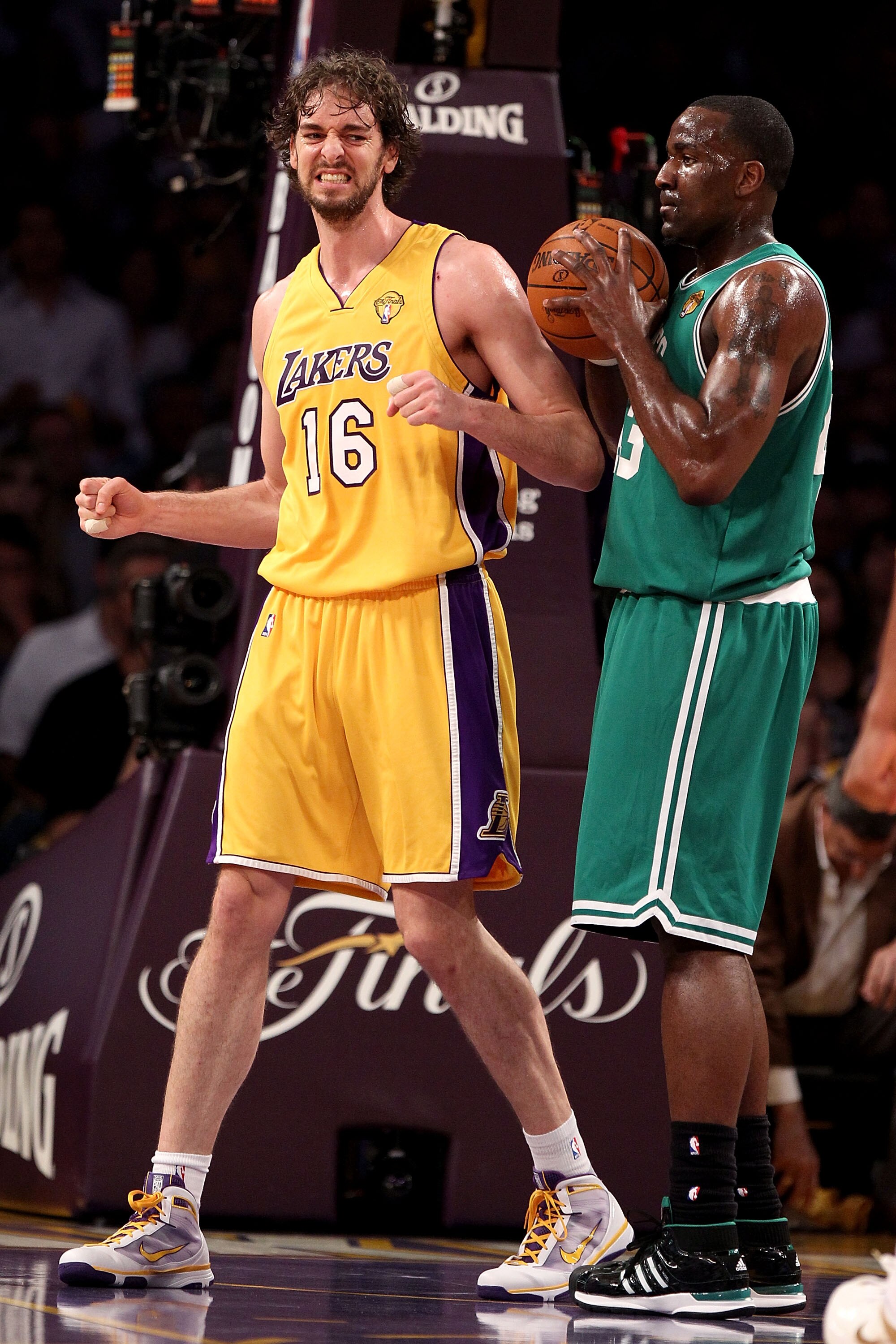 LOS ANGELES, CA - JUNE 15:  Pau Gasol #16 of the Los Angeles Lakers reacts alongside Kendrick Perkins #43 of the Boston Celtics in the first period of Game Six of the 2010 NBA Finals at Staples Center on June 15, 2010 in Los Angeles, California.  NOTE TO