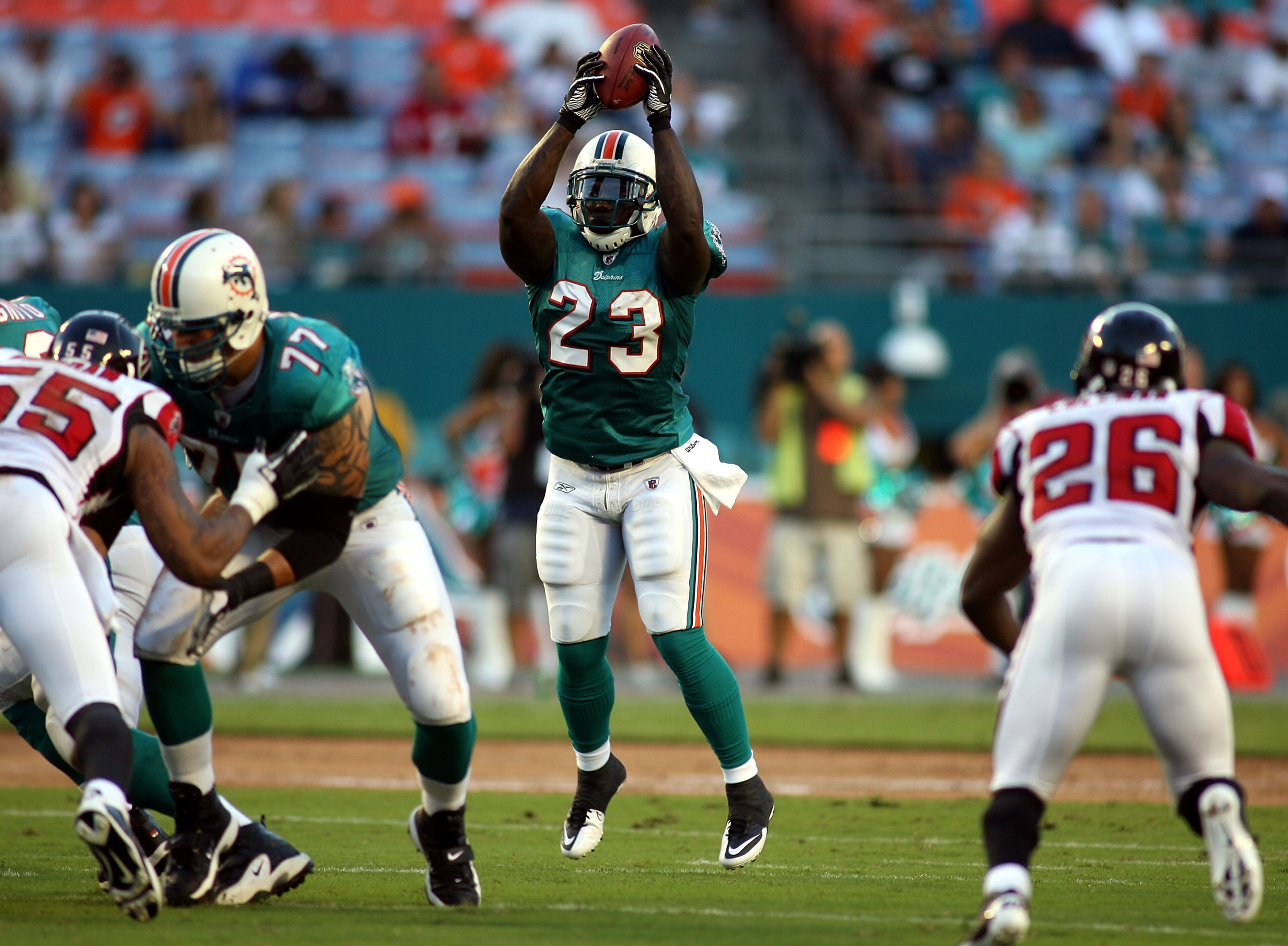 MIAMI - AUGUST 27:  Running back Ronnie Brown #23 of the Miami Dolphins takes a direct snap in the wild cat formation against the Atlanta Falcons during pre season action at Sun Life Stadium on August 27, 2010 in Miami, Florida.  (Photo by Marc Serota/Get