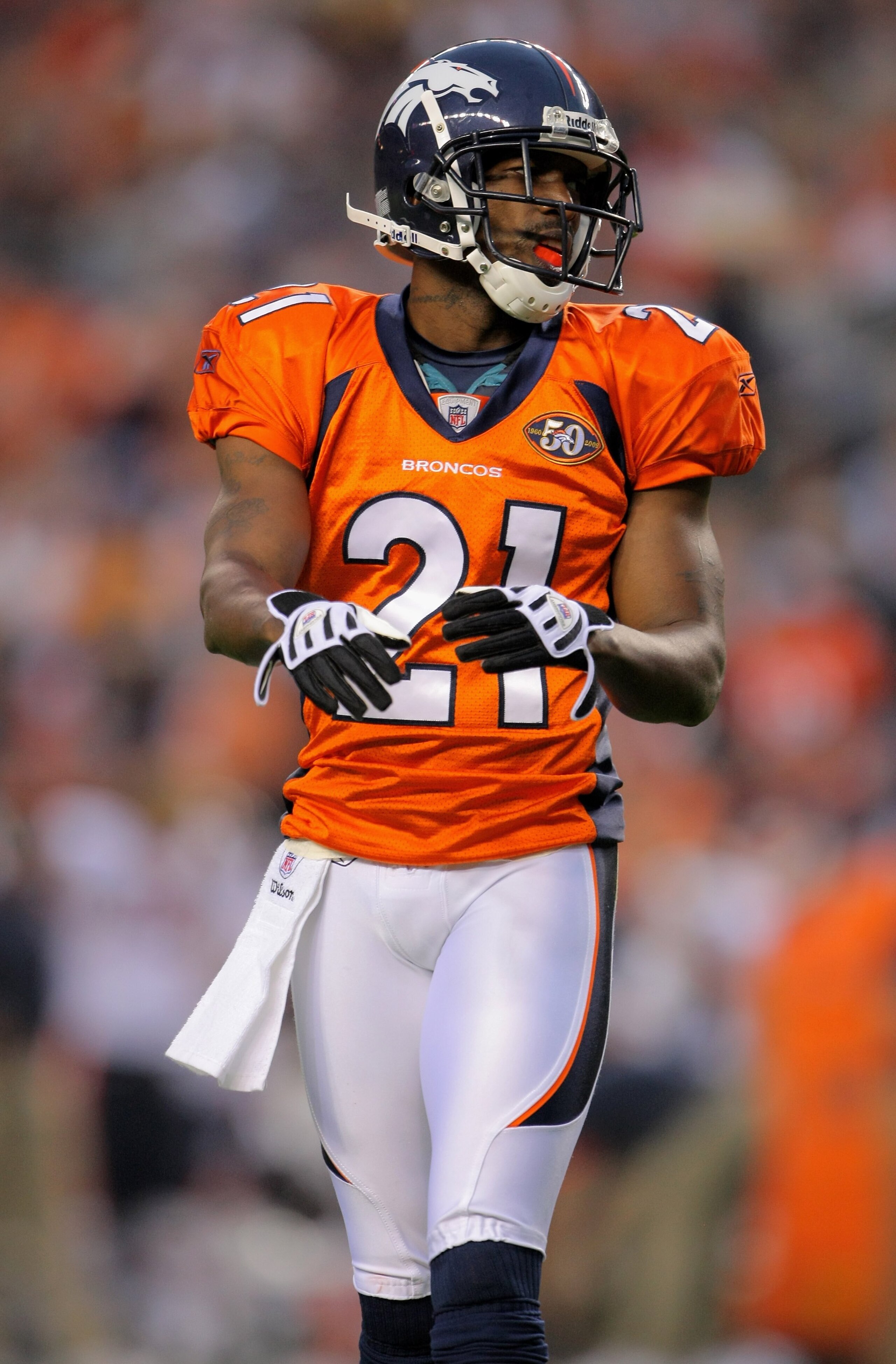DENVER - AUGUST 30:  Cornerback Andre Goodman #21 of the Denver Broncos awaits action against the Chicago Bears during preseason NFL action at INVESCO Field at Mile High on August 30, 2009 in Denver, Colorado. The Bears defeated the Broncos 27-17.  (Photo