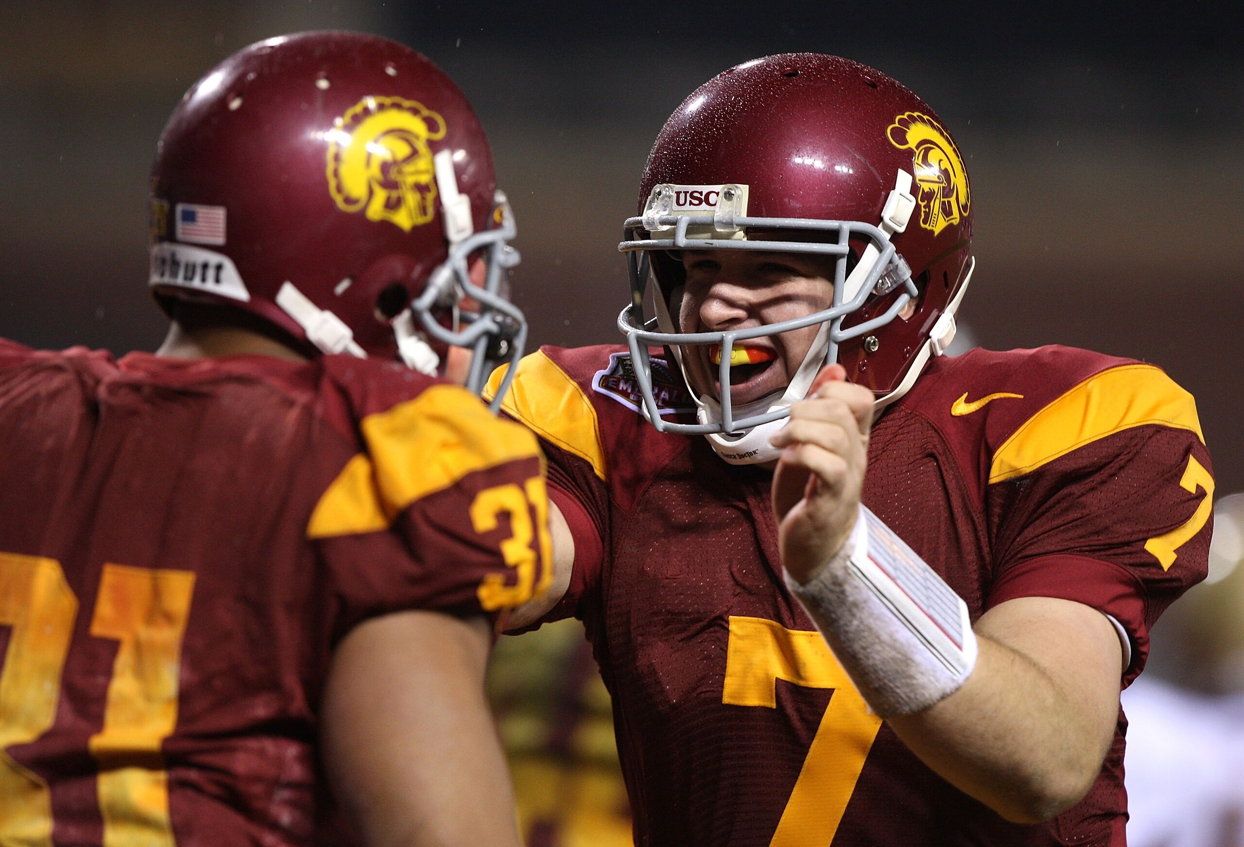SAN FRANCISCO - DECEMBER 26: Matt Barkley #7 of the USC Trojans celebrates with Stanley Havili #31 after scoring a touchdown in the second quarter against the Boston College Eagles during the 2009 Emerald Bowl at AT&T Park on December 26, 2009 in San Fran