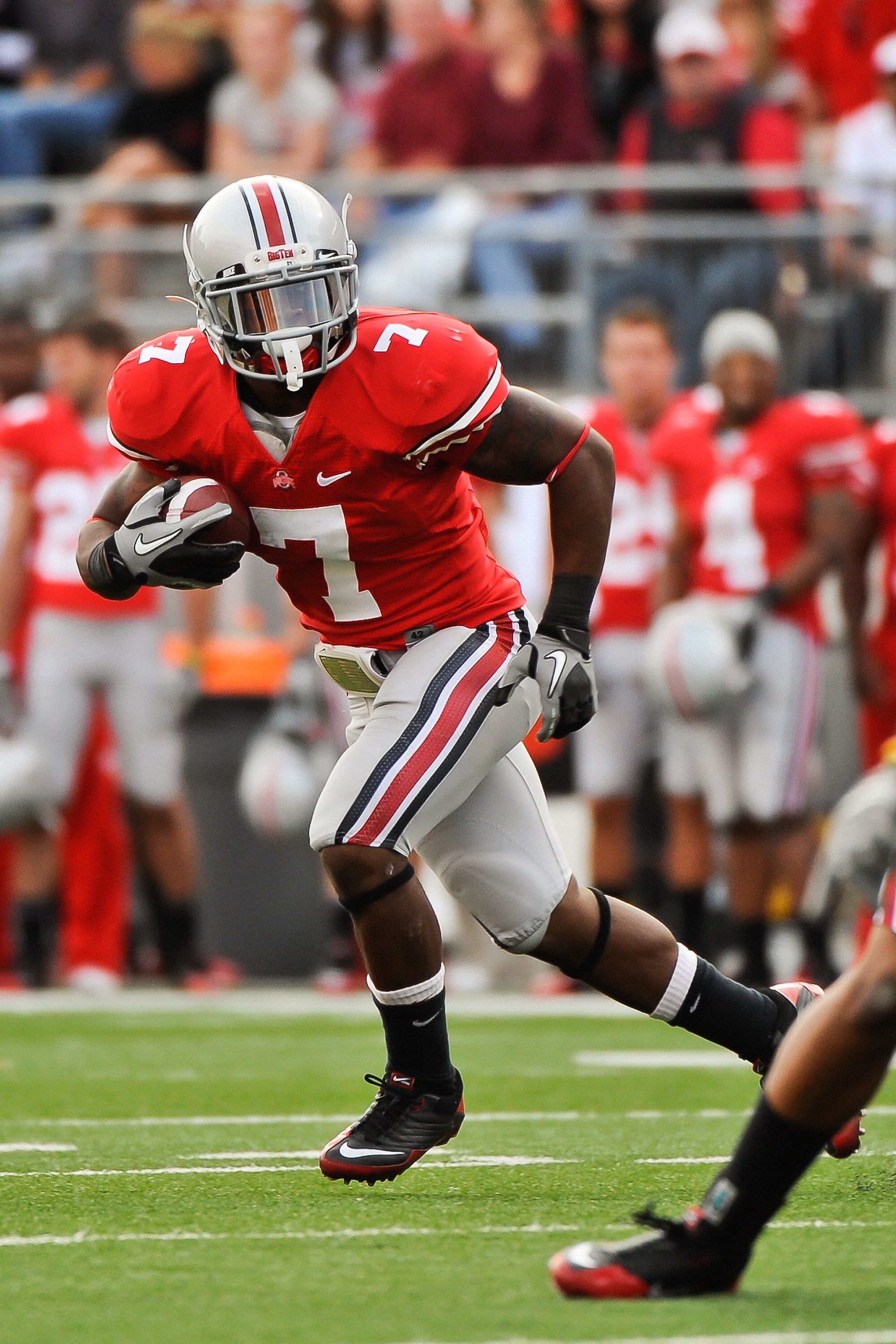 COLUMBUS, OH - SEPTEMBER 25:  Jordan Hall #7 of the Ohio State Buckeyes runs with the ball against the Eastern Michigan Eagles at Ohio Stadium on September 25, 2010 in Columbus, Ohio.  Ohio State won 73-20. (Photo by Jamie Sabau/Getty Images)