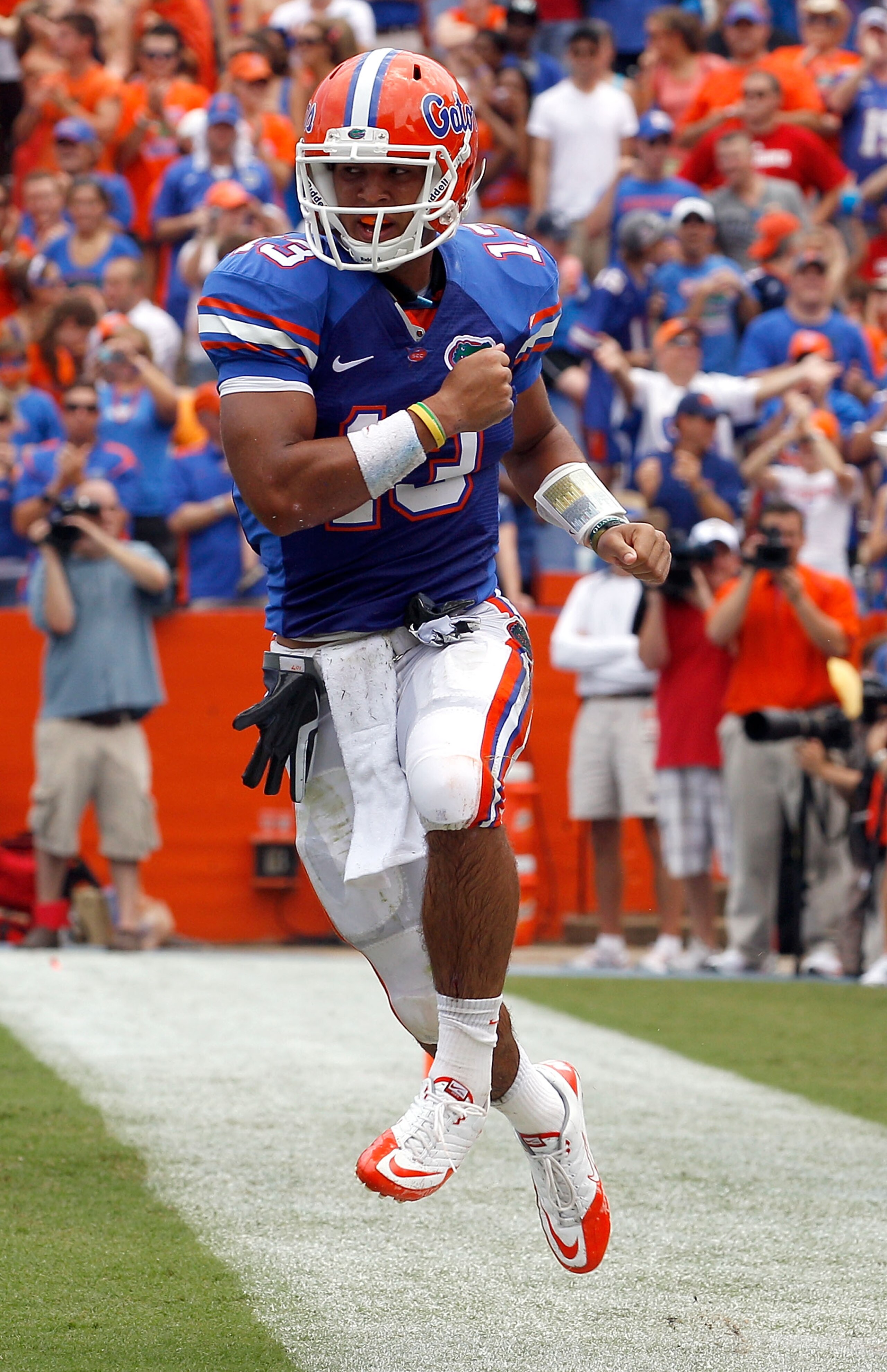 GAINESVILLE, FL - SEPTEMBER 04:  Quarterback Trey Burton #13 of the Florida Gators celebrates following a touchdown against the Miami University RedHawkks at Ben Hill Griffin Stadium on September 4, 2010 in Gainesville, Florida.  (Photo by Sam Greenwood/G