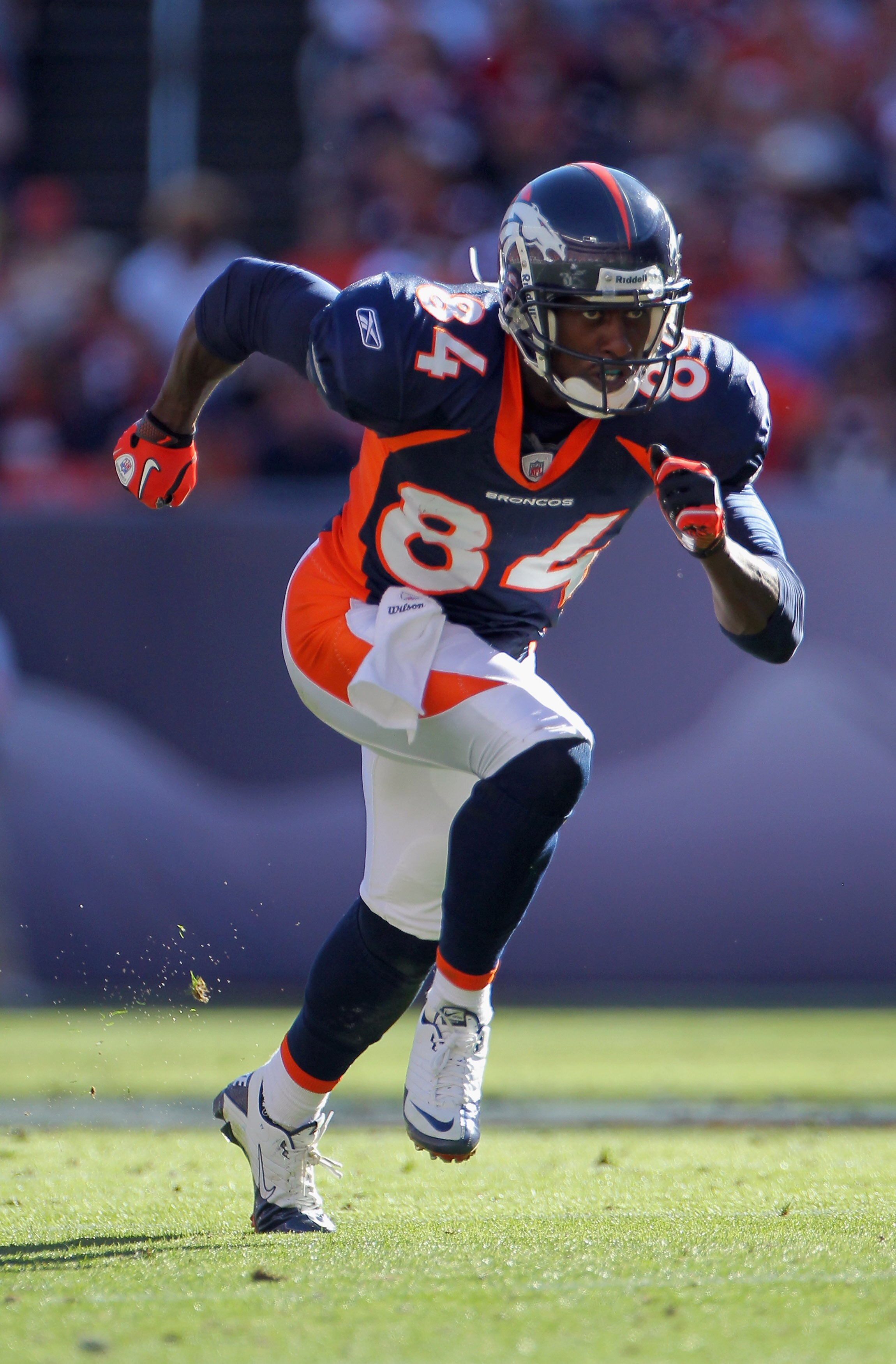 DENVER - SEPTEMBER 19:  Wide receiver Brandon Lloyd #84 of the Denver Broncos leaves the line of scrimmage against the Seattle Seahawks at INVESCO Field at Mile High on September 19, 2010 in Denver, Colorado. The Broncos defeated the Seahawks 31-14.  (Pho
