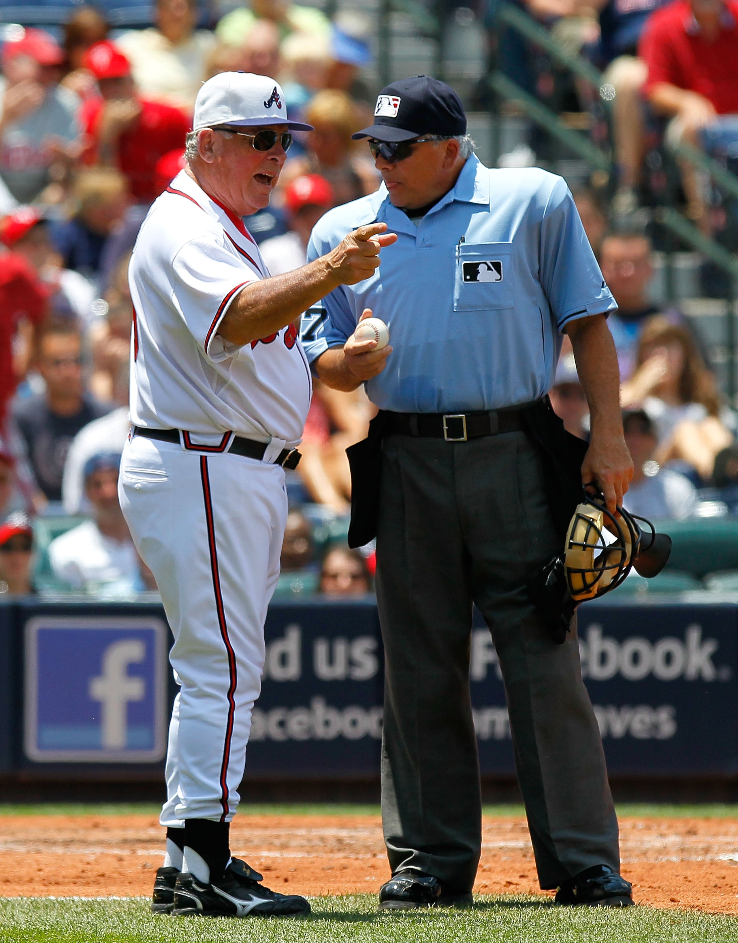 ATLANTA - MAY 31:  Manager Bobby Cox #6 of the Atlanta Braves argues a call with homeplate umpire Larry Vanover #27 in the third inning against the Philadelphia Phillies at Turner Field on May 31, 2010 in Atlanta, Georgia.  (Photo by Kevin C. Cox/Getty Im