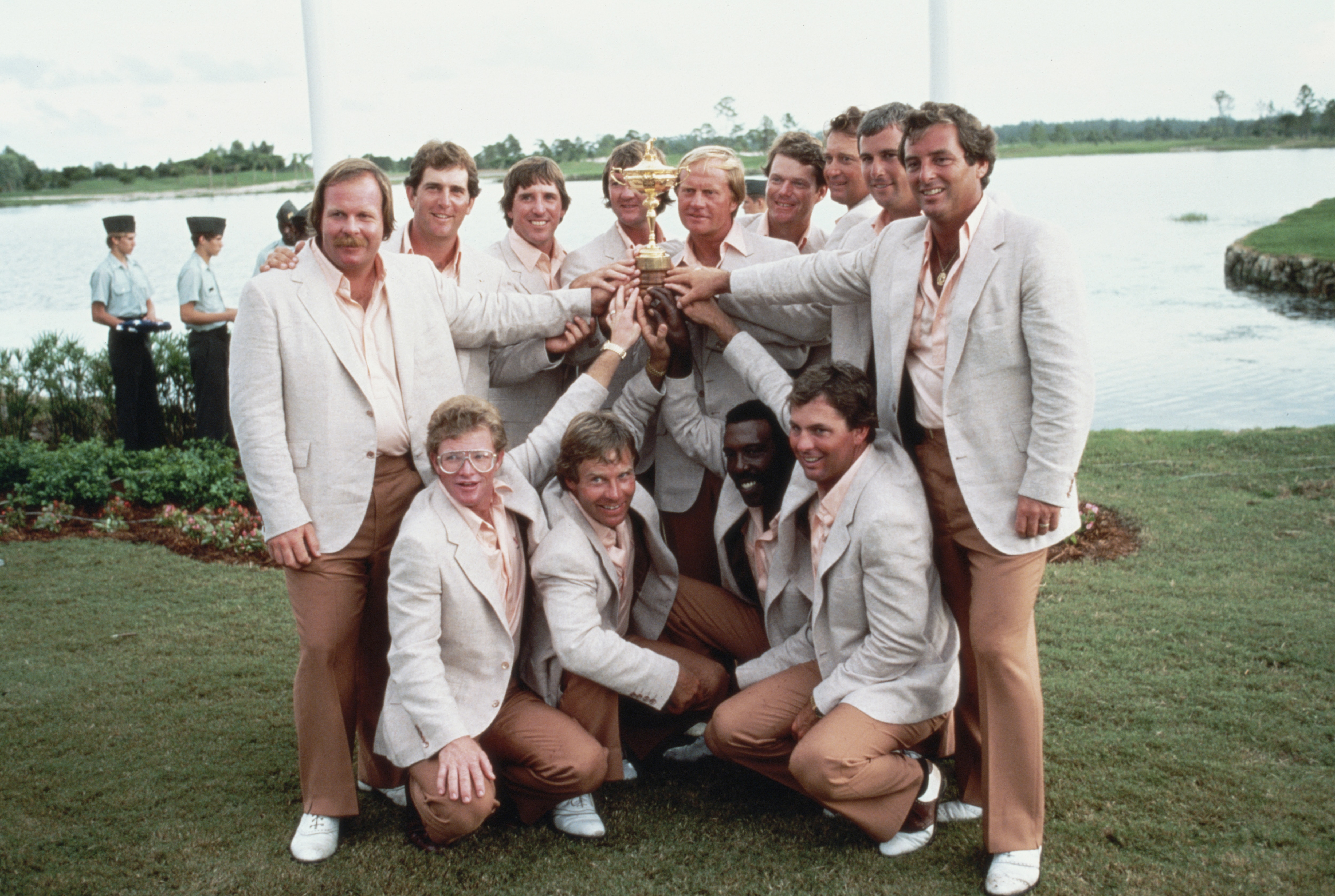 Jack Nicklaus, Captain of the United States team holds the Ryder Cup trophy with team members Fuzzy Zoeller, Jay Haas, Gil Morgan, Bob Gilder, Ben Crenshaw, Calvin Peete, Curtis Strange,Tom Kite, Craig Stadler, Lanny Wadkins, Raymond Floyd and Tom Watson 