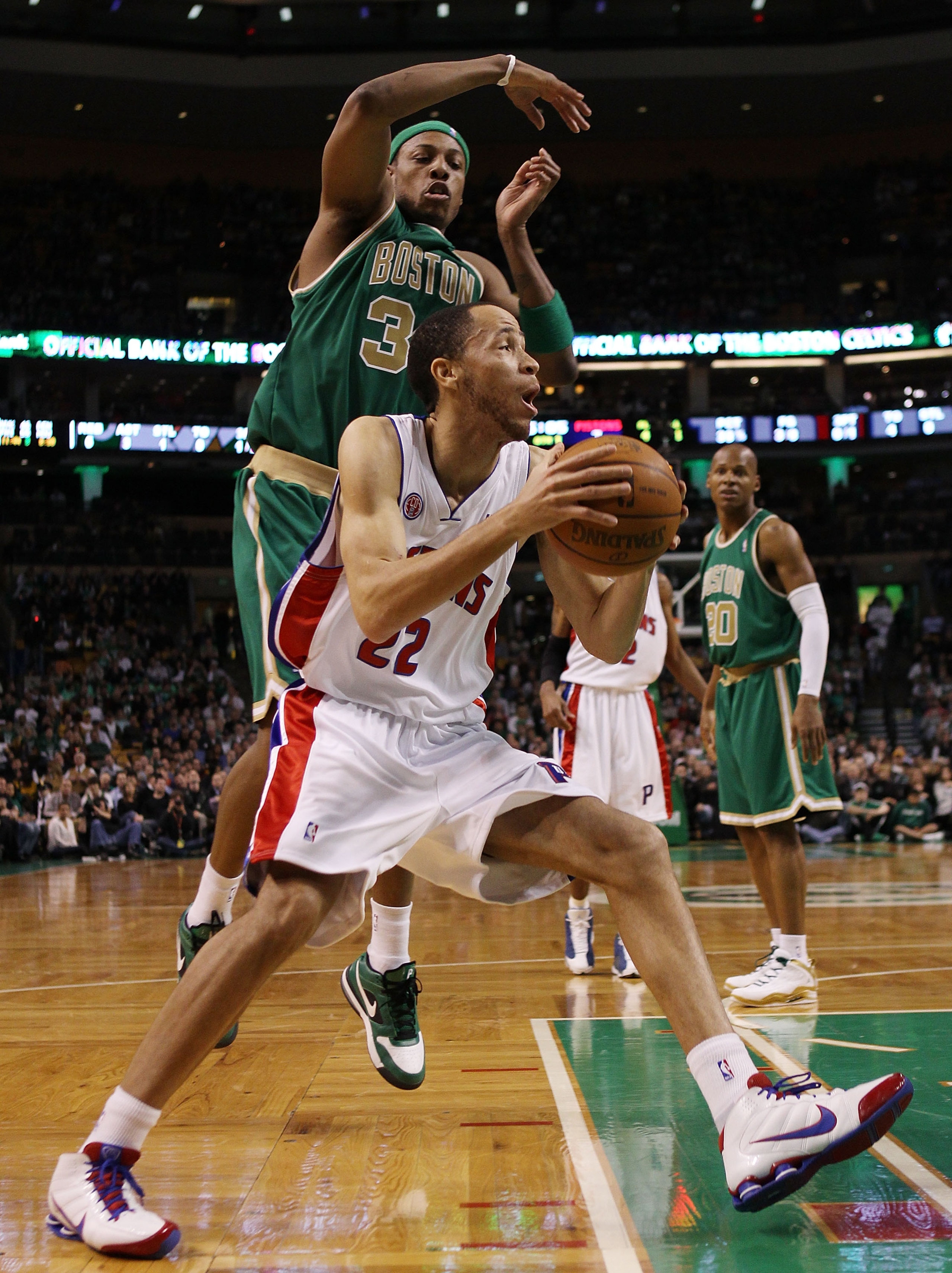 BOSTON - MARCH 15:  Tayshaun Prince #22 of the Detroit Pistons heads for the net as Paul Pierce #34 of the Boston Celtics defends on March 15, 2010 at the TD Garden in Boston, Massachusetts.  NOTE TO USER: User expressly acknowledges and agrees that, by d