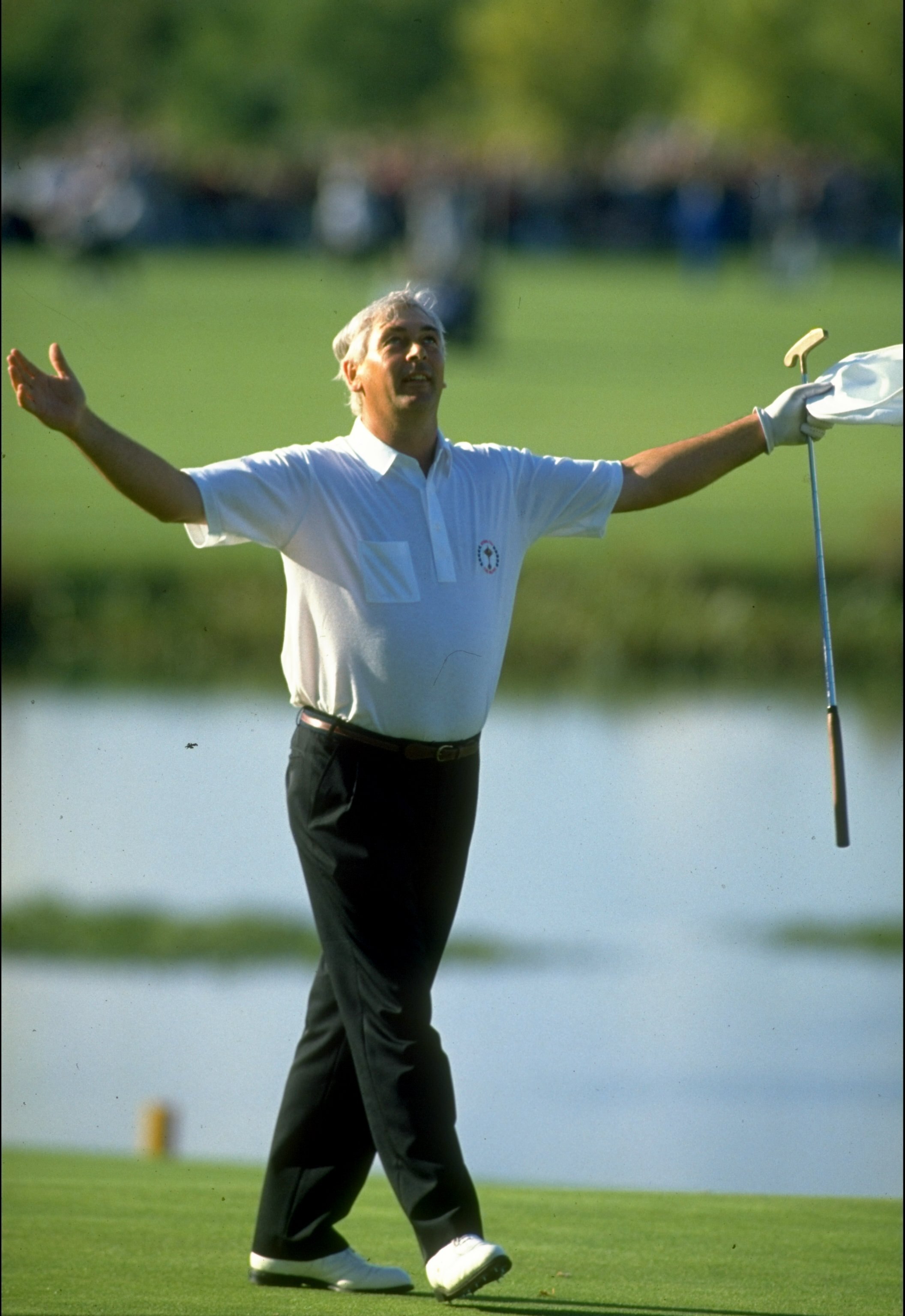 1989:  European team member Christy O''Connor Junior seals their victory by beating Fred Couples of the USA during the Ryder Cup at The Belfry golf Club in Sutton Coldfield, England. The event finished in a 14-14 draw which was enough for Europe to retain