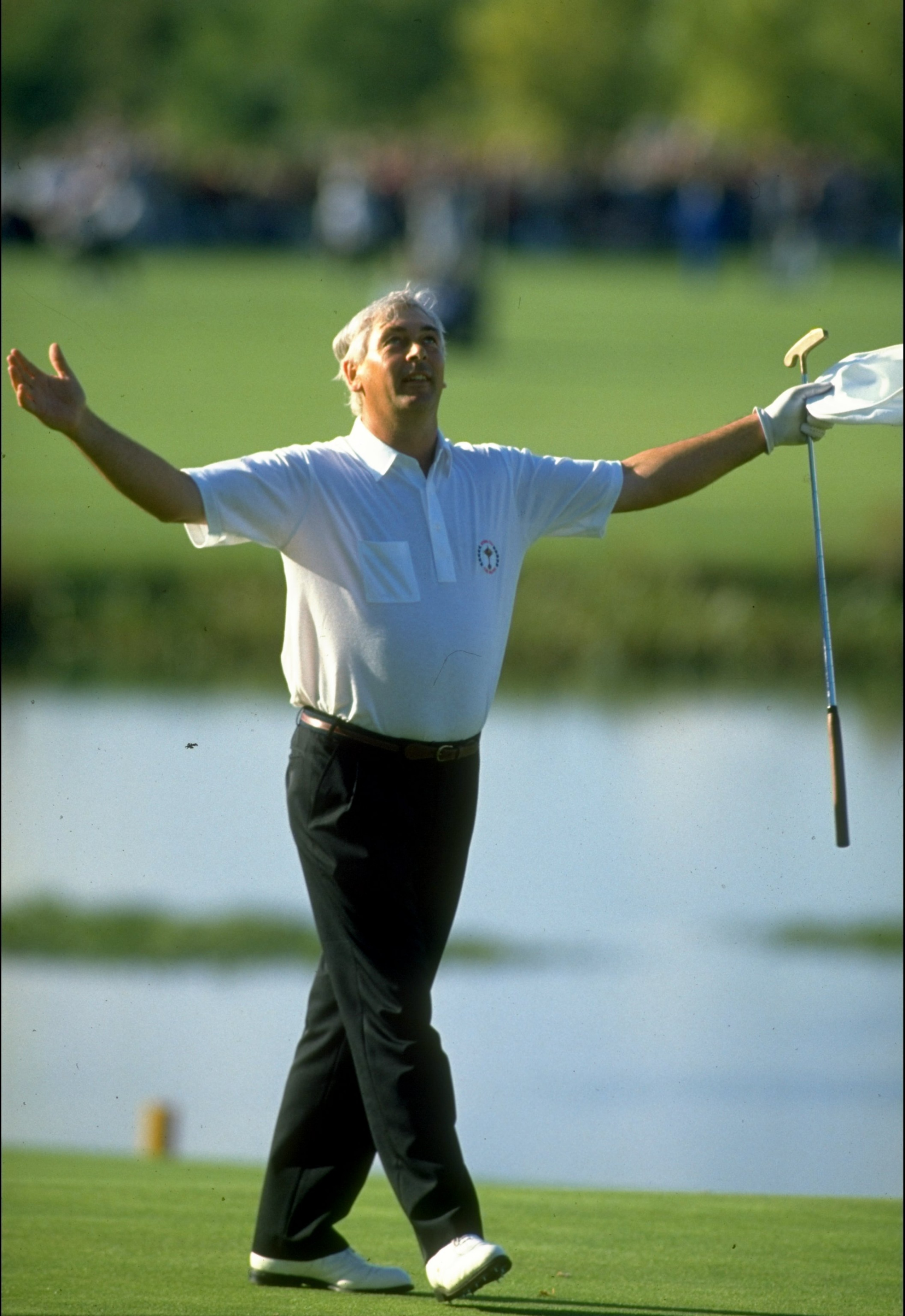 1989:  European team member Christy O''Connor Junior seals their victory by beating Fred Couples of the USA during the Ryder Cup at The Belfry golf Club in Sutton Coldfield, England. The event finished in a 14-14 draw which was enough for Europe to retain
