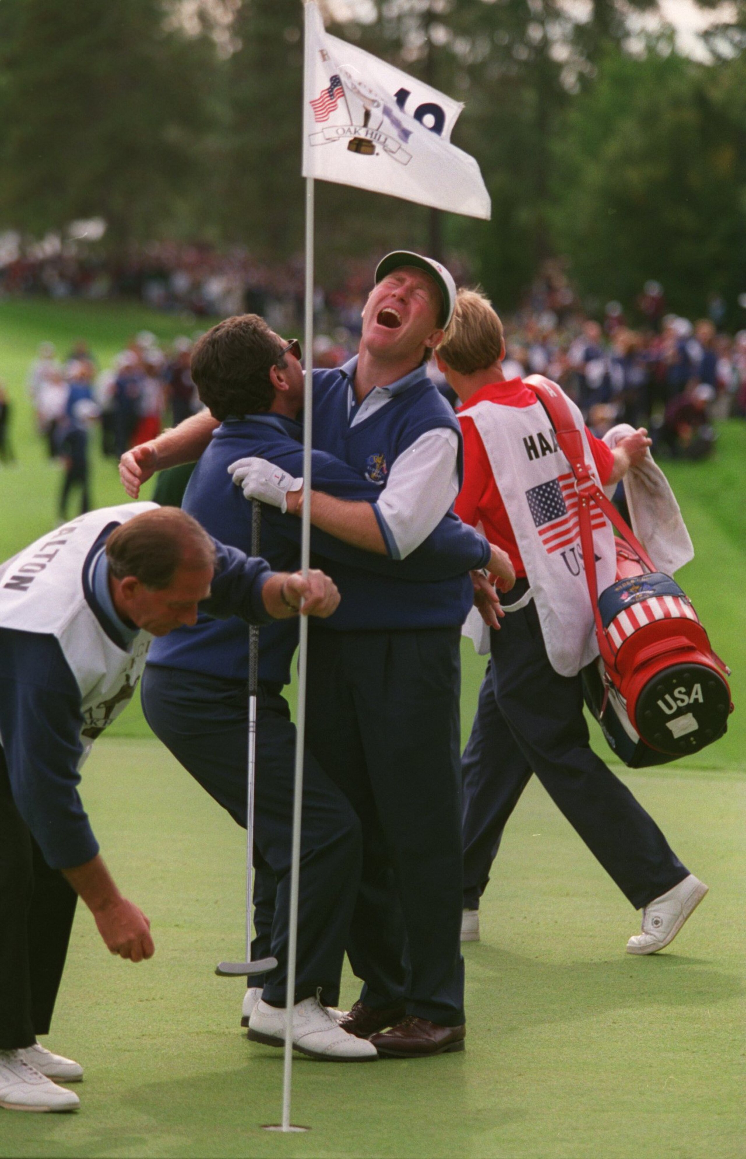 24 SEP 1995:  PHILIP WALTON OF IRELAND IS CONGRATULATED BY BERNARD GALLACHER AFTER WINNING THE 1995 RYDER CUP FOR EUROPE ON THE 18TH GREEN AT OAK HILL COUNTRY CLUB IN ROCHESTER, NEW YORK. Mandatory Credit: Simon Bruty/ALLSPORT