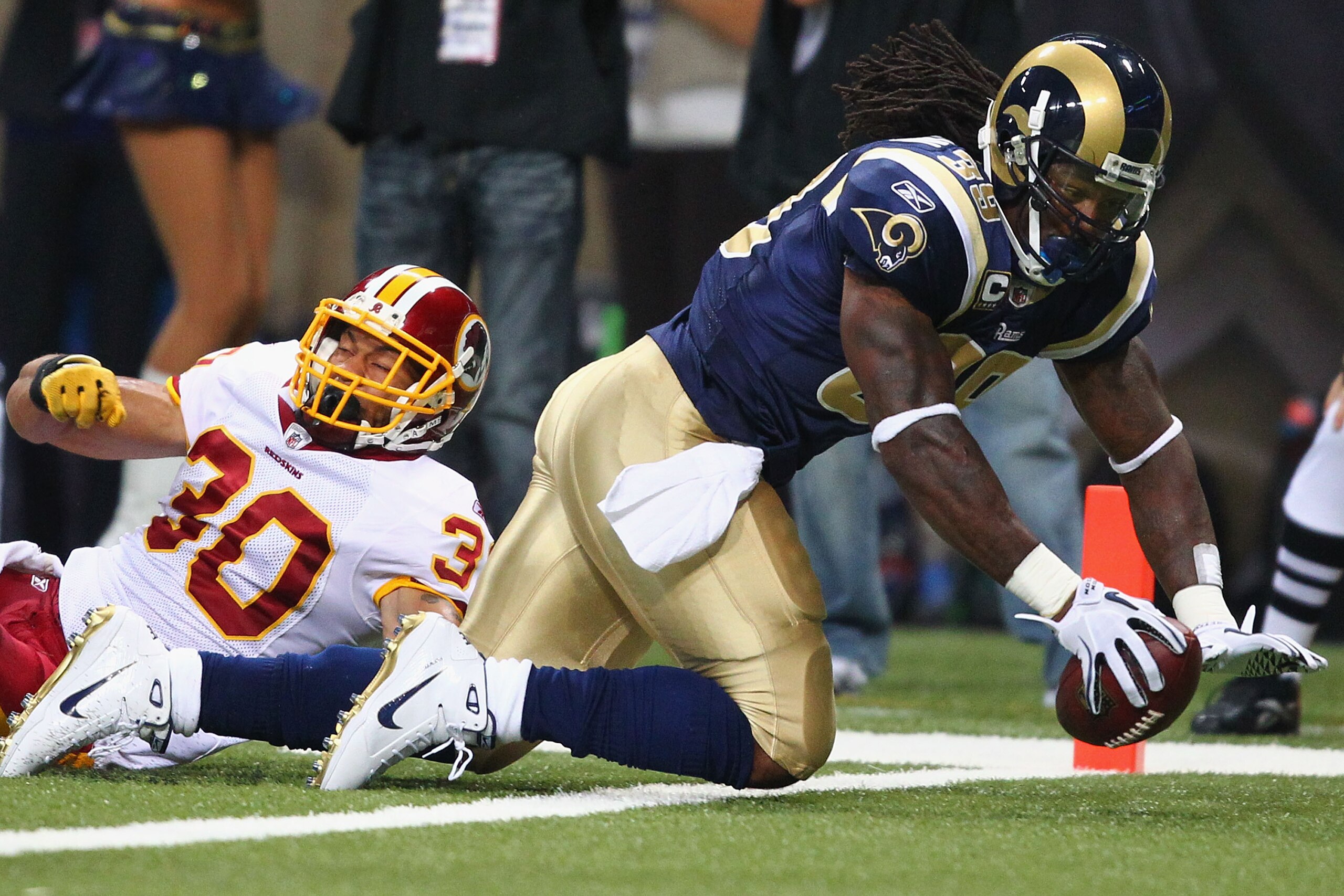 ST. LOUIS - SEPTEMBER 26: Steven Jackson #39 of the St. Louis Rams scores a touchdown against LaRon Landry #30 of the Washington Redskins at the Edward Jones Dome on September 26, 2010 in St. Louis, Missouri.  The Rams beat the Redskins 30-16.  (Photo by 