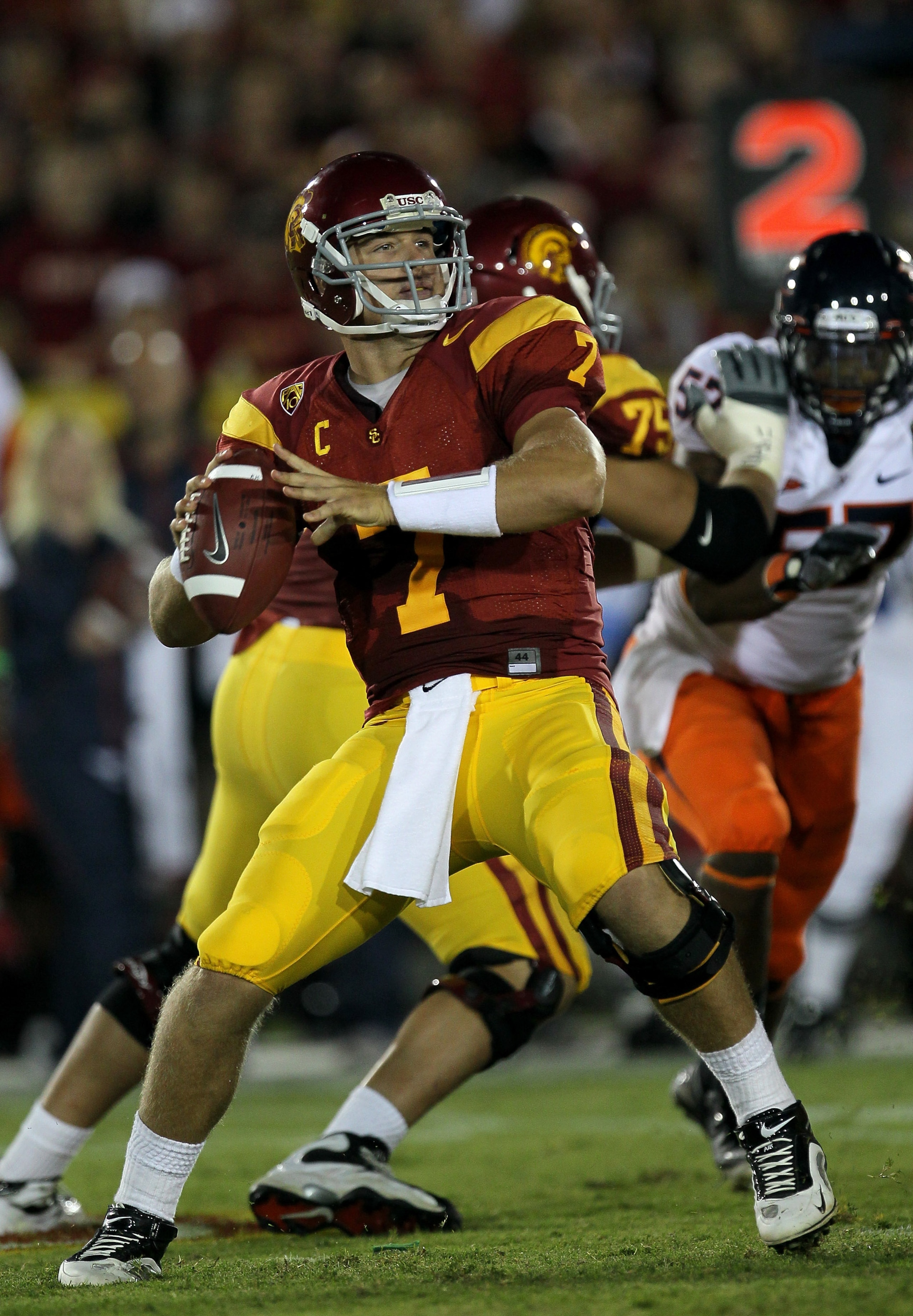LOS ANGELES, CA - SEPTEMBER 11:  Quarterback Matt Barkley #7 of the USC Trojans throws a pass against the Virginia Cavaliers at Los Angeles Memorial Coliseum on September 11, 2010 in Los Angeles, California. USC won 17-14.  (Photo by Stephen Dunn/Getty Im