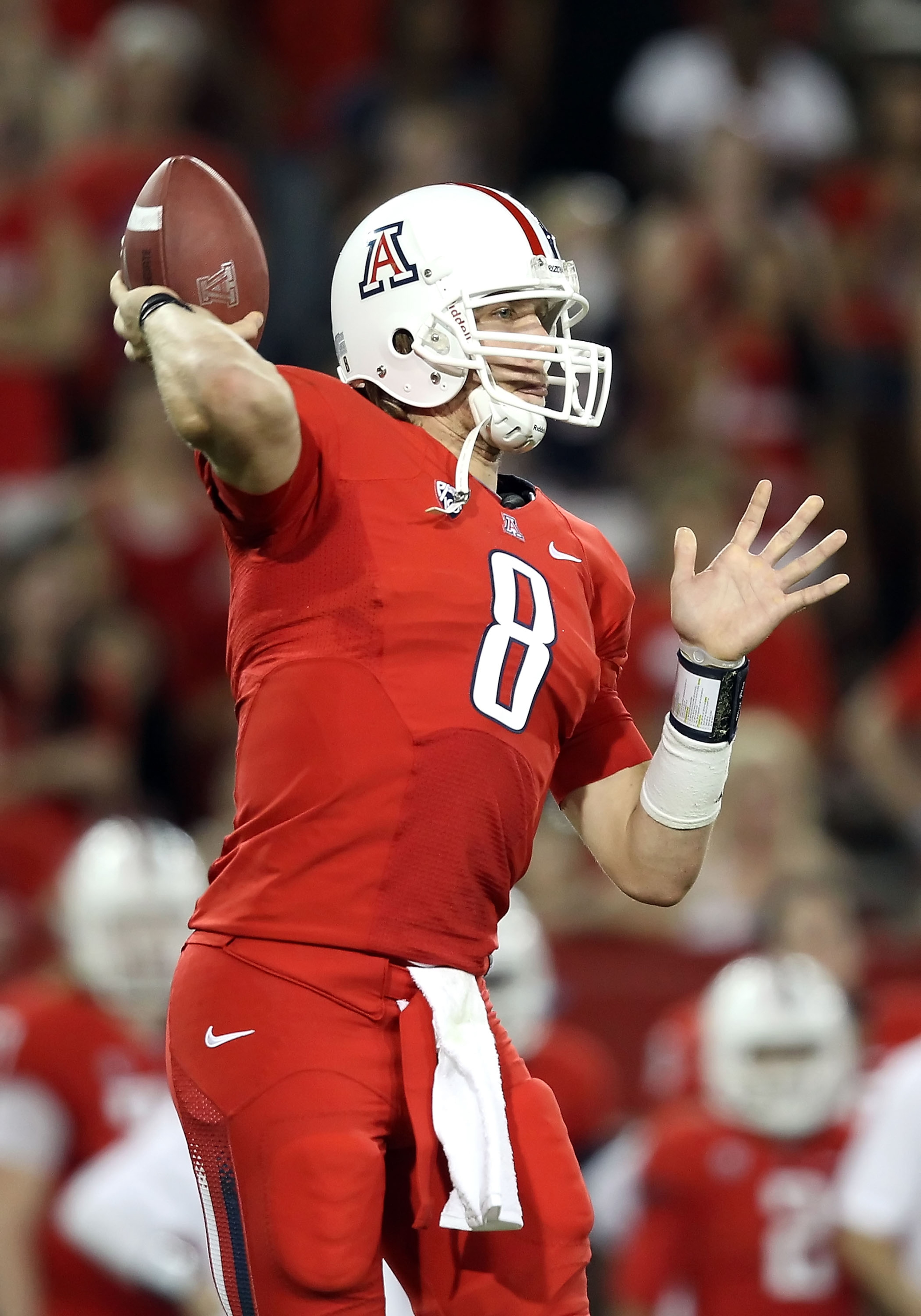 TUCSON, AZ - SEPTEMBER 25:  Quarterback Nick Foles #8 of the Arizona Wildcats throws a pass during the college football game against the California Golden Bears at Arizona Stadium on September 25, 2010 in Tucson, Arizona.   The Wildcats defeated the Golde