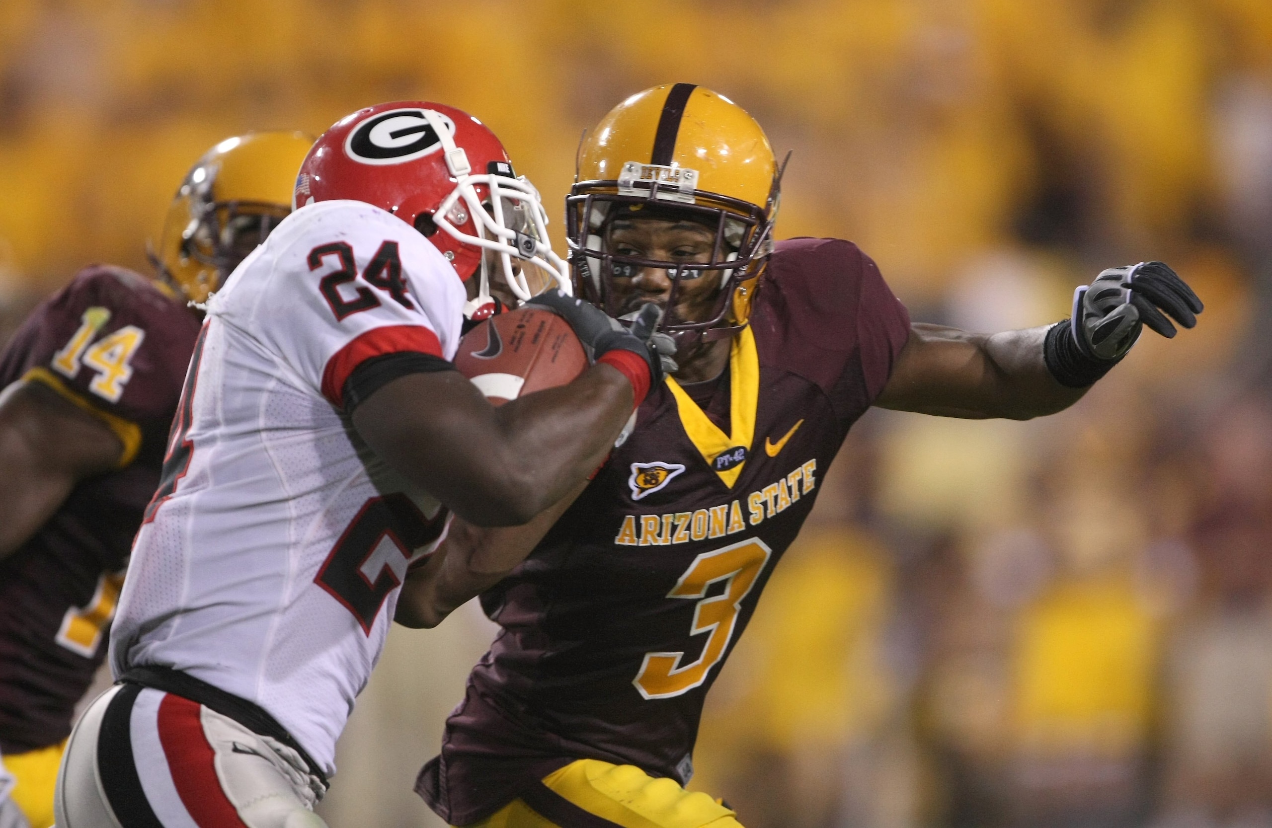 TEMPE, AZ - SEPTEMBER 20:  Wide receiver Tavarres King #12 of the Georgia Bulldogs carries the ball against cornerback Omar Bolden #3 of the Arizona State Sun Devils on September 20, 2008 at Sun Devil Stadium in Tempe, Arizona.  Georgia won 27-10.  (Photo