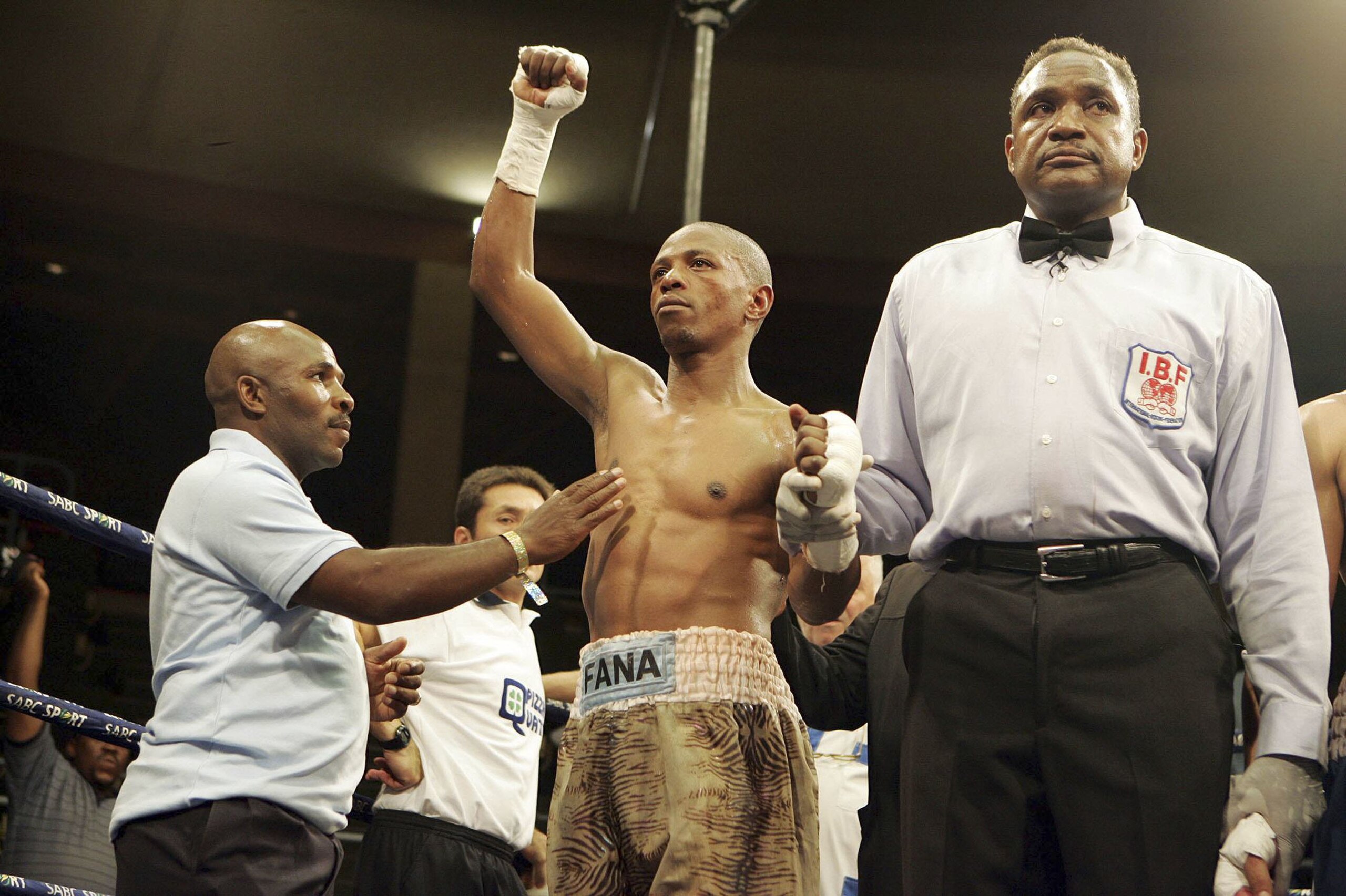 JOHANNESBURG, SOUTH AFRICA - DECEMBER 8:  Mzonke Fana celebrates a win over Roberto Arrieta in the IBF junior lightweight eliminator match at the Nasrec Indoor Arena December 8, 2006 in Johannesburg, South Africa.  (Photo by Lefty Shivambu/Gallo Images/Ge