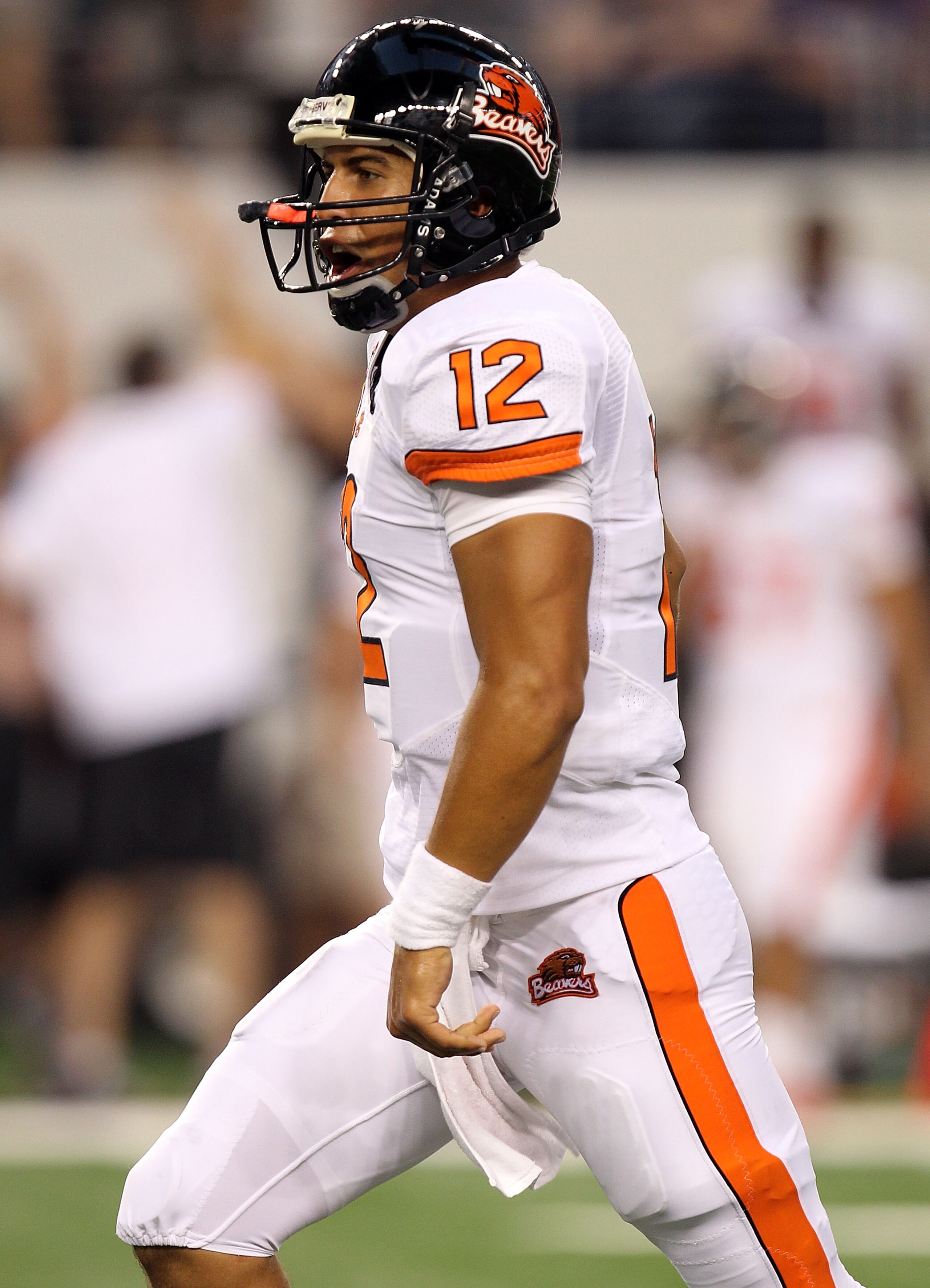 ARLINGTON, TX - SEPTEMBER 04:  Quarterback Ryan Katz #12 of the Oregon State Beavers celebrates a touchdown against the TCU Horned Frogs in the second quarter at Cowboys Stadium on September 4, 2010 in Arlington, Texas.  (Photo by Ronald Martinez/Getty Im