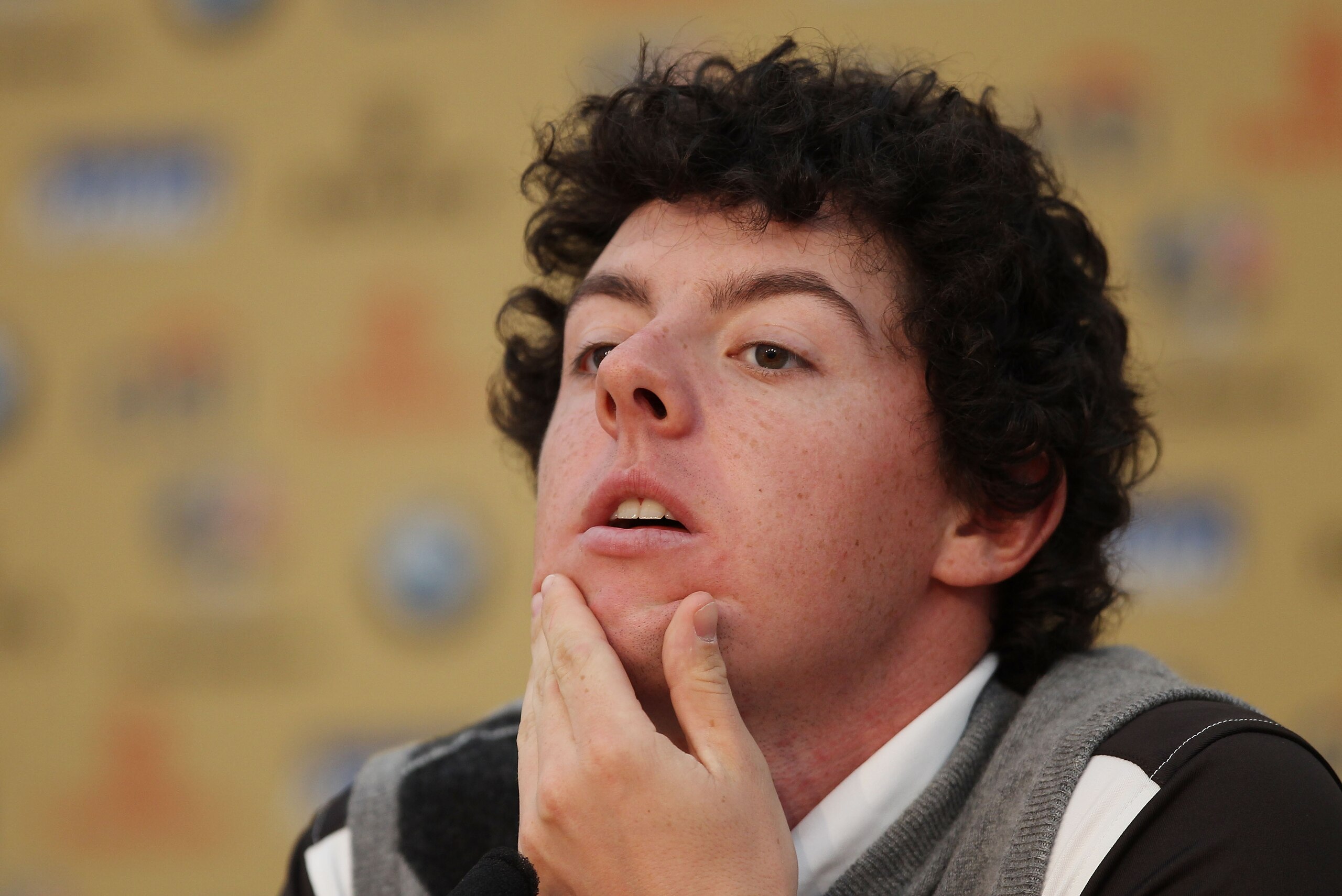 NEWPORT, WALES - SEPTEMBER 28:  Rory McIlroy of the Europe Team answers questions from the media at a press conference following a practice round prior to the 2010 Ryder Cup at the Celtic Manor Resort on September 28, 2010 in Newport, Wales.  (Photo by Ro