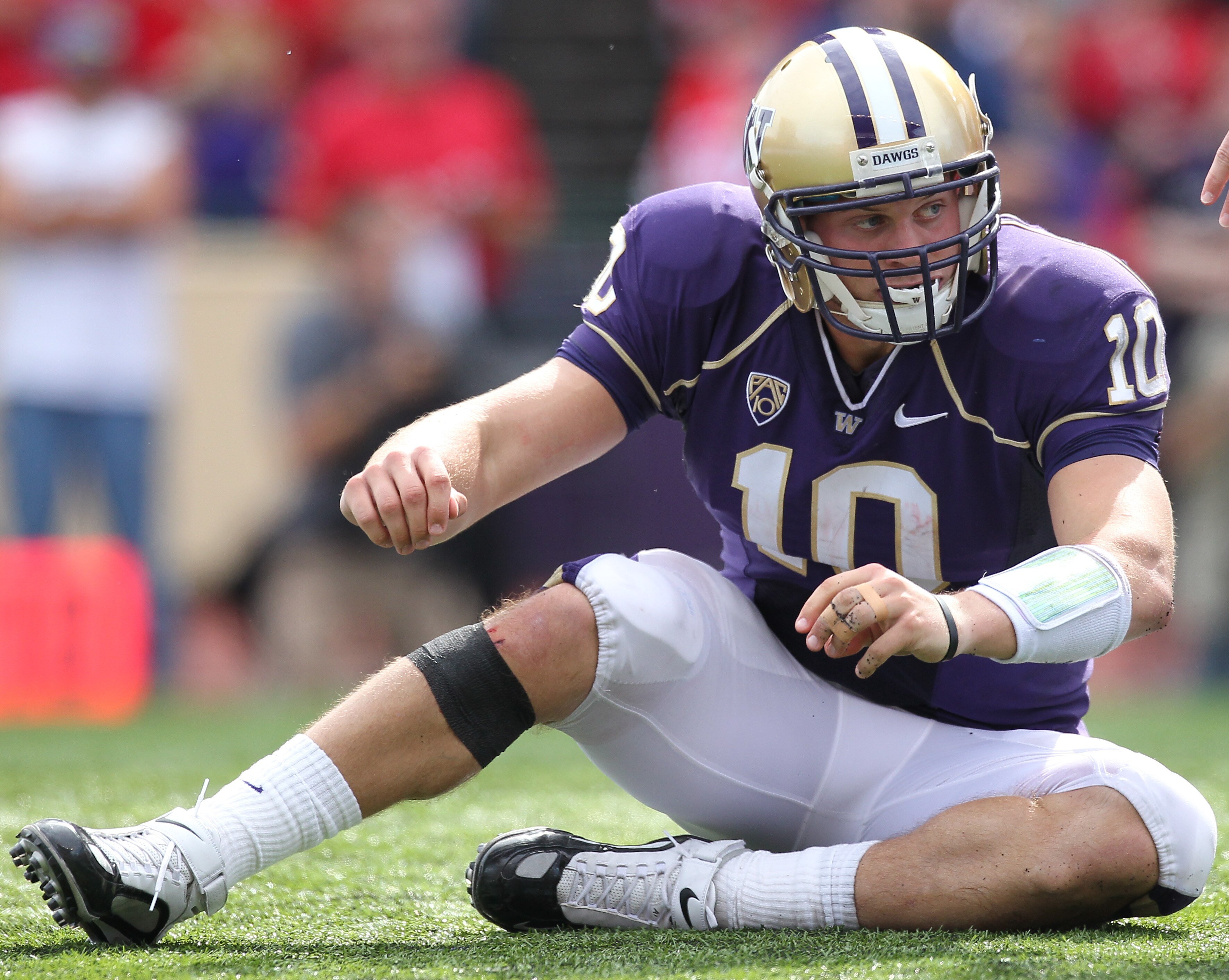 SEATTLE - SEPTEMBER 18: Quarterback Jake Locker #10 of the Washington Huskies gets up after being tackled during the game against the Nebraska Cornhuskers on September 18, 2010 at Husky Stadium in Seattle, Washington. (Photo by Otto Greule Jr/Getty Images SEATTLE - SEPTEMBER 18: Quarterback Jake Locker #10 of the Washington Huskies gets up after being tackled during the game against the Nebraska Cornhuskers on September 18, 2010 at Husky Stadium in Seattle, Washington. (Photo by Otto Greule Jr/Getty Images