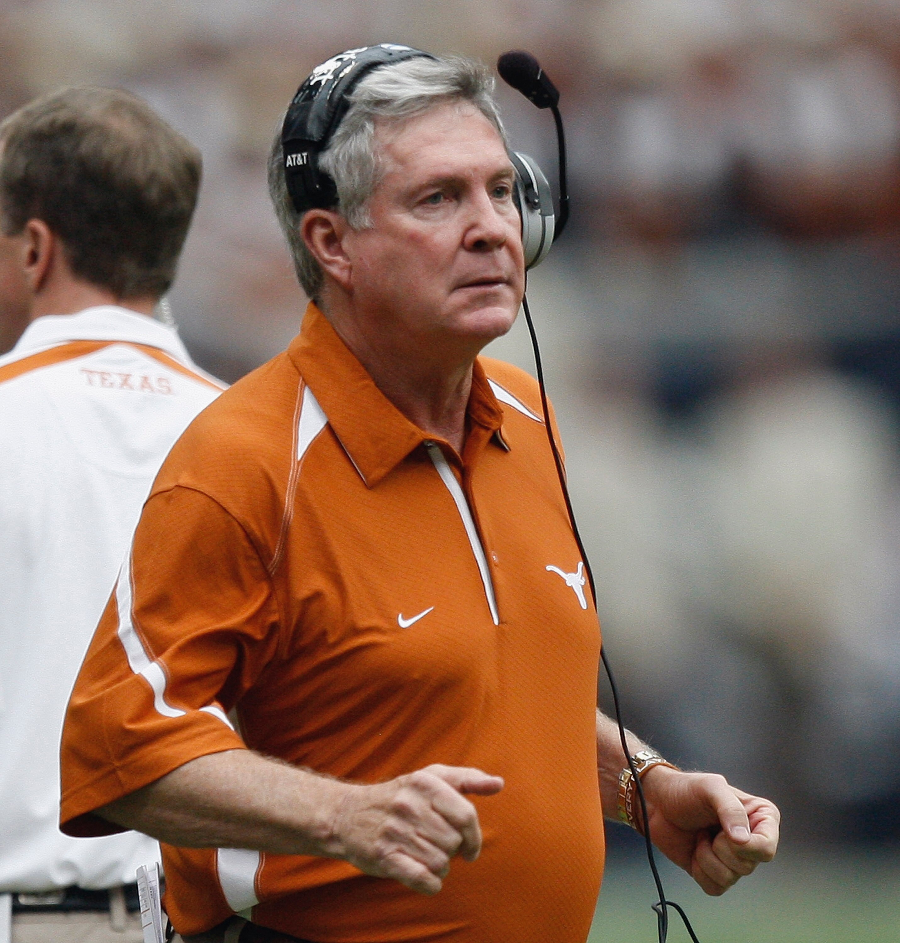 HOUSTON - SEPTEMBER 04:  Head coach Mack Brown of the Texas Longhorns looks on from the sidelines during the season opener against the Rice Owls at Reliant Stadium on September 4, 2010 in Houston, Texas.  (Photo by Bob Levey/Getty Images)