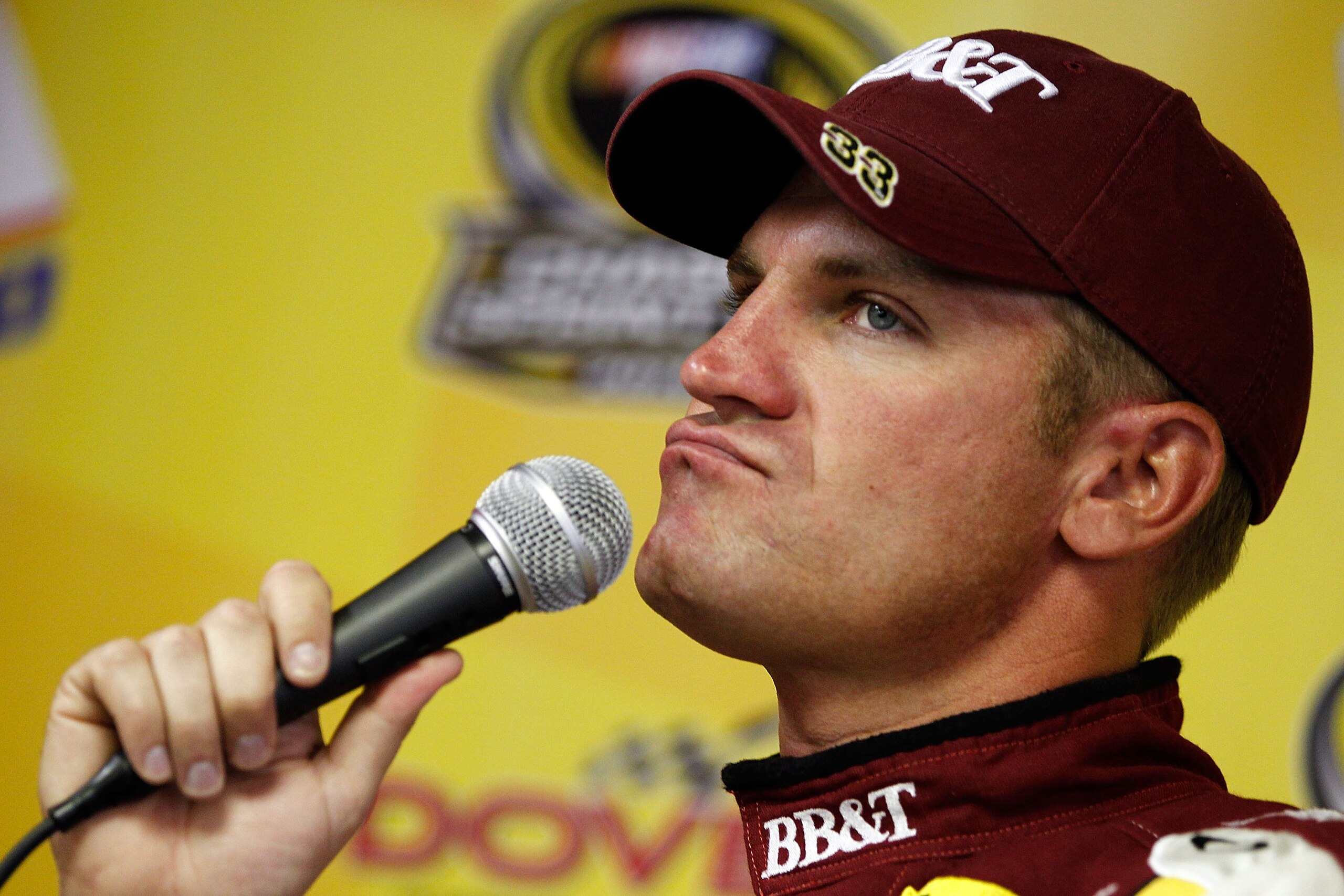 DOVER, DE - SEPTEMBER 24:  Clint Bowyer, driver of the #33 BB&T Chevrolet, speaks to the media prior to practice for the NASCAR Sprint Cup Series AAA 400 at Dover International Speedway on September 24, 2010 in Dover, Delaware.  (Photo by Jeff Zelevansky/