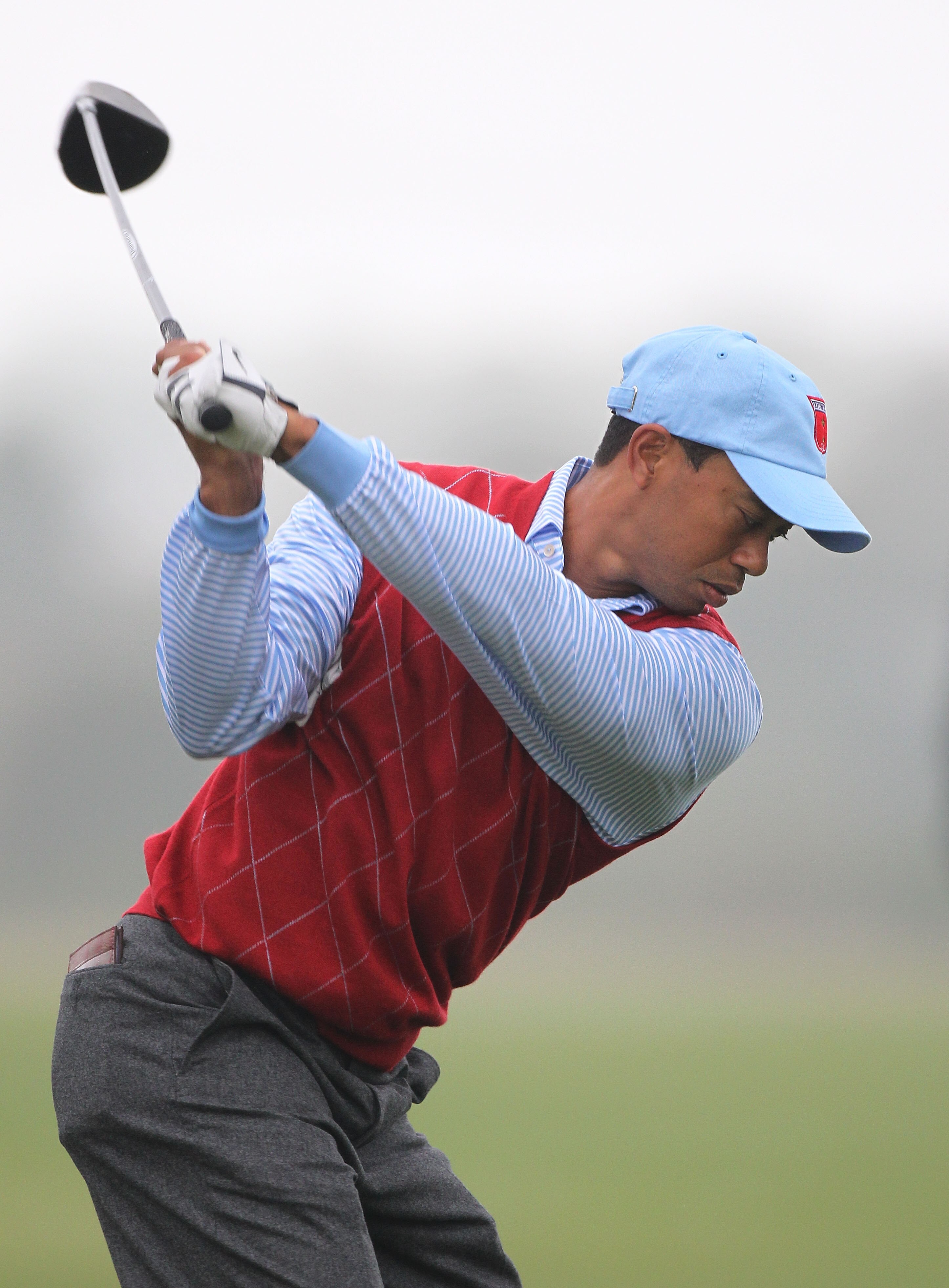 NEWPORT, WALES - SEPTEMBER 28:  Tiger Woods of the USA tees off during a practice round prior to the 2010 Ryder Cup at the Celtic Manor Resort on September 28, 2010 in Newport, Wales.  (Photo by Andy Lyons/Getty Images)