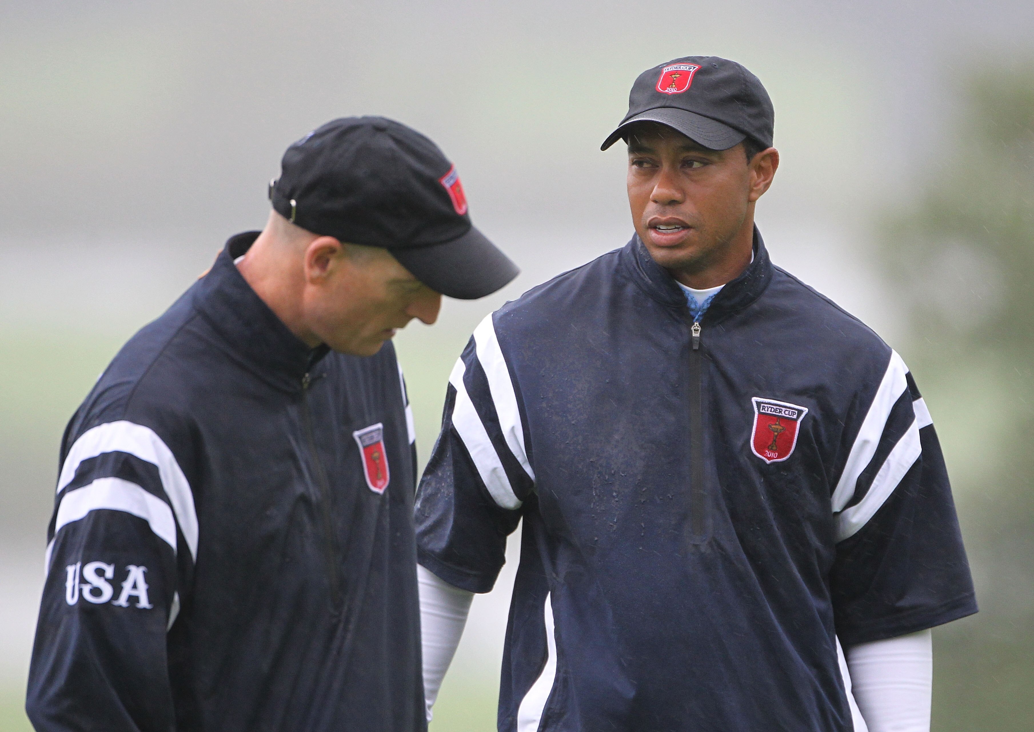 NEWPORT, WALES - SEPTEMBER 29:  Tiger Woods of the USA chats with Jim Furyk (L) during a practice round prior to the 2010 Ryder Cup at the Celtic Manor Resort on September 29, 2010 in Newport, Wales.  (Photo by Jamie Squire/Getty Images)