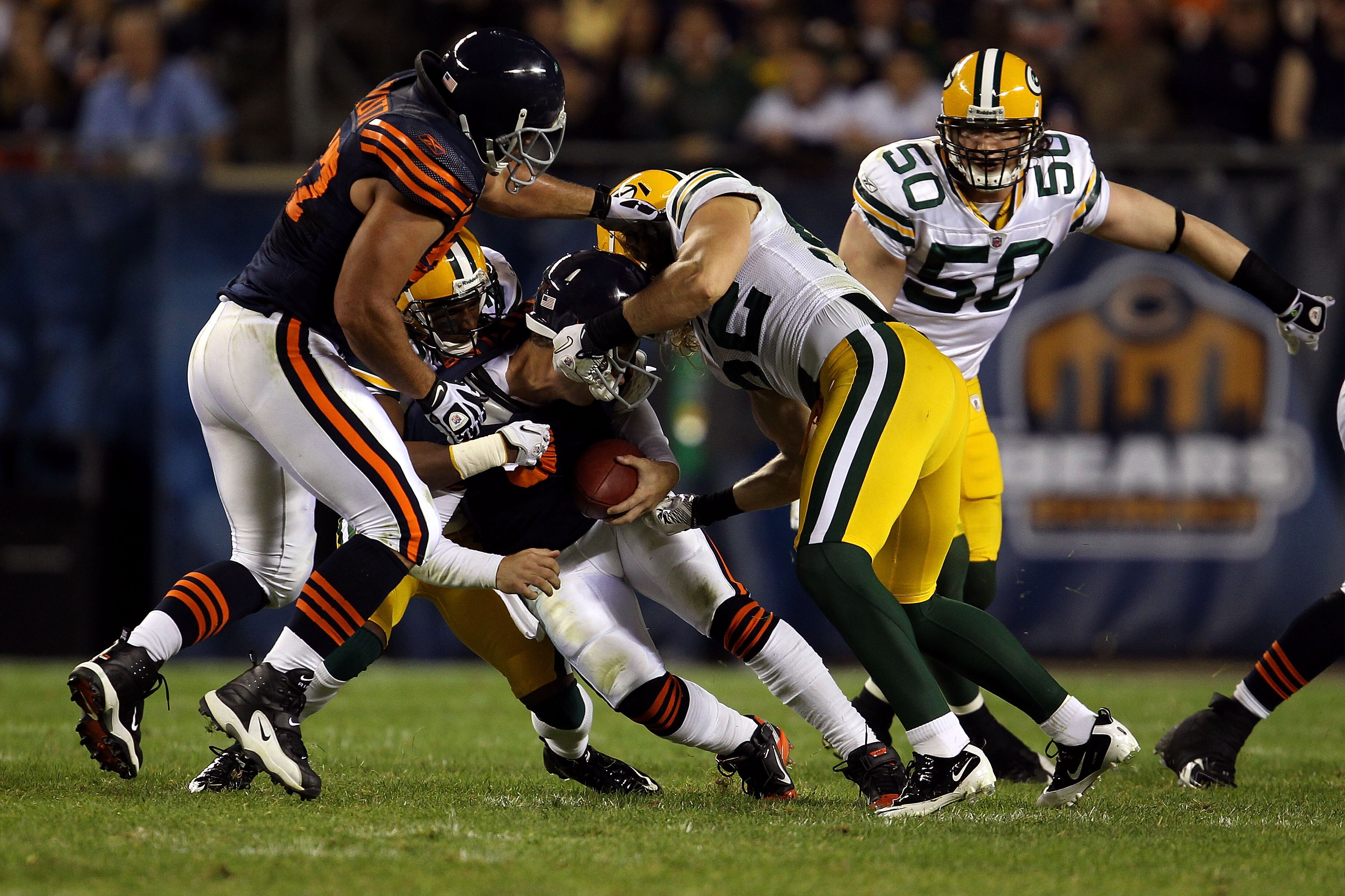 CHICAGO - SEPTEMBER 27: Jay Cutler #6 of the Chicago Bears has his face mask grabbed by Clay Matthews #52 against the Green Bay Packers as he is tackled in the first half at Soldier Field on September 27, 2010 in Chicago, Illinois. (Photo by Jonathan Da CHICAGO - SEPTEMBER 27: Jay Cutler #6 of the Chicago Bears has his face mask grabbed by Clay Matthews #52 against the Green Bay Packers as he is tackled in the first half at Soldier Field on September 27, 2010 in Chicago, Illinois. (Photo by Jonathan Da