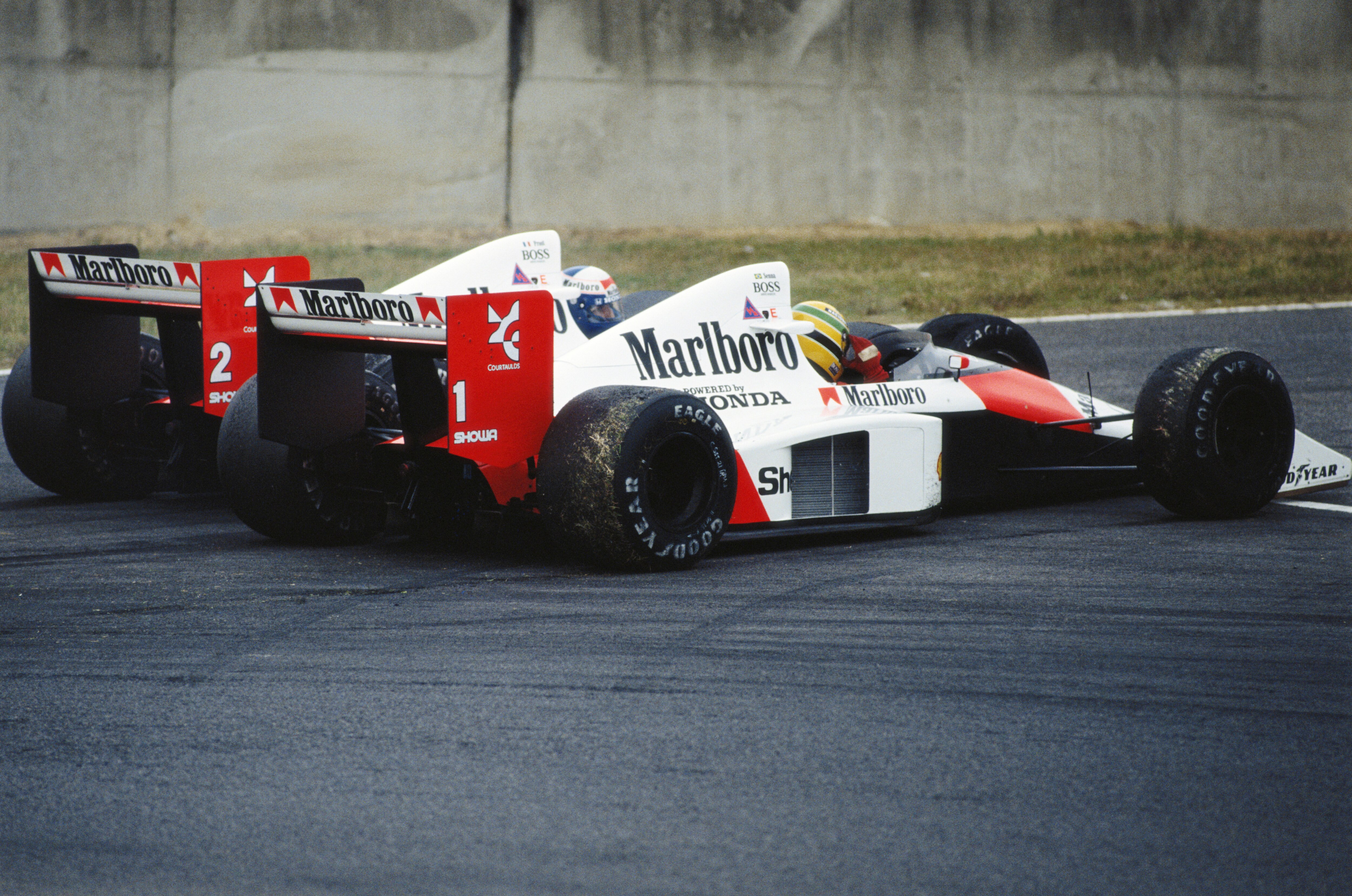 Alain Prost driving the Marlboro McLaren-Honda MP4/5 controversially collides with his team mate Ayrton Senna during the Japanese Grand Prix on 22 October 1989 at the Suzuka Circuit in Suzuka, Japan. The Japanese Grand Prix decided the 1989 Drivers' Champ