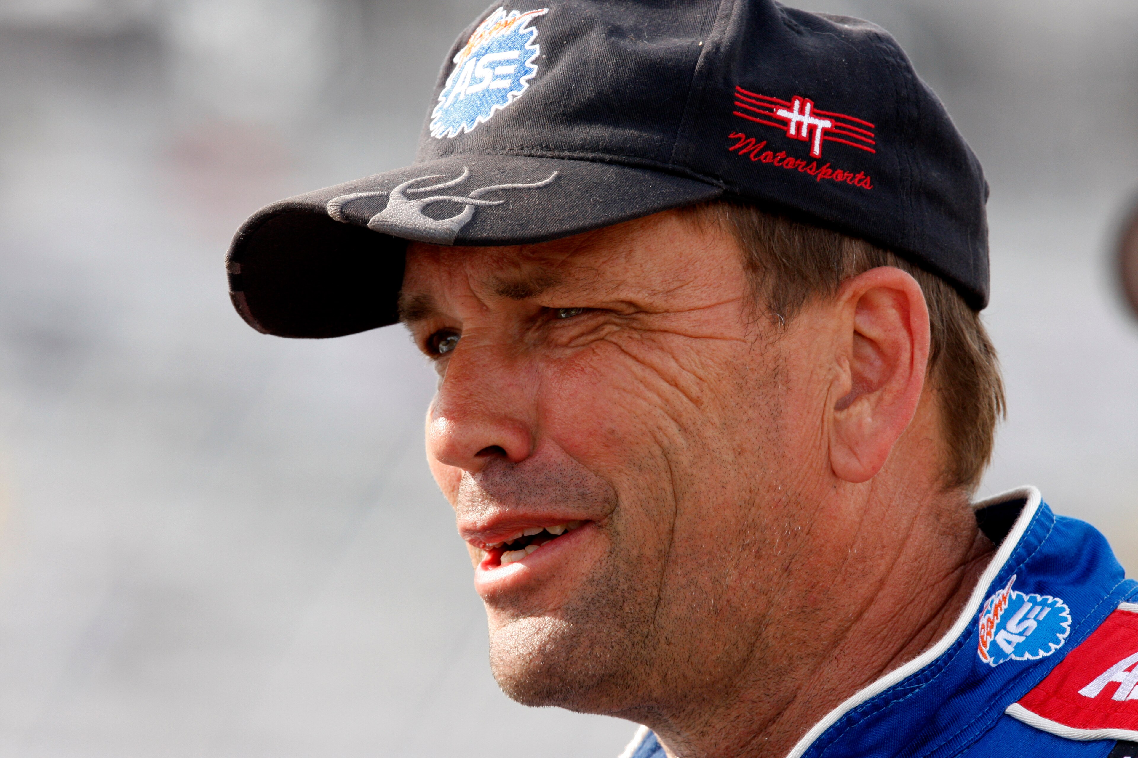 WEST ALLIS, WI - JUNE 20: Ted Musgrave, driver of the #59 Team ASE/Harris Trucking Toyota talks in the pits during qualifying for the NASCAR Craftsman Truck Series Camping World RV Sales 200 on June 20, 2008 at the Milwaukee Mile race track in West Allis WEST ALLIS, WI - JUNE 20: Ted Musgrave, driver of the #59 Team ASE/Harris Trucking Toyota talks in the pits during qualifying for the NASCAR Craftsman Truck Series Camping World RV Sales 200 on June 20, 2008 at the Milwaukee Mile race track in West Allis