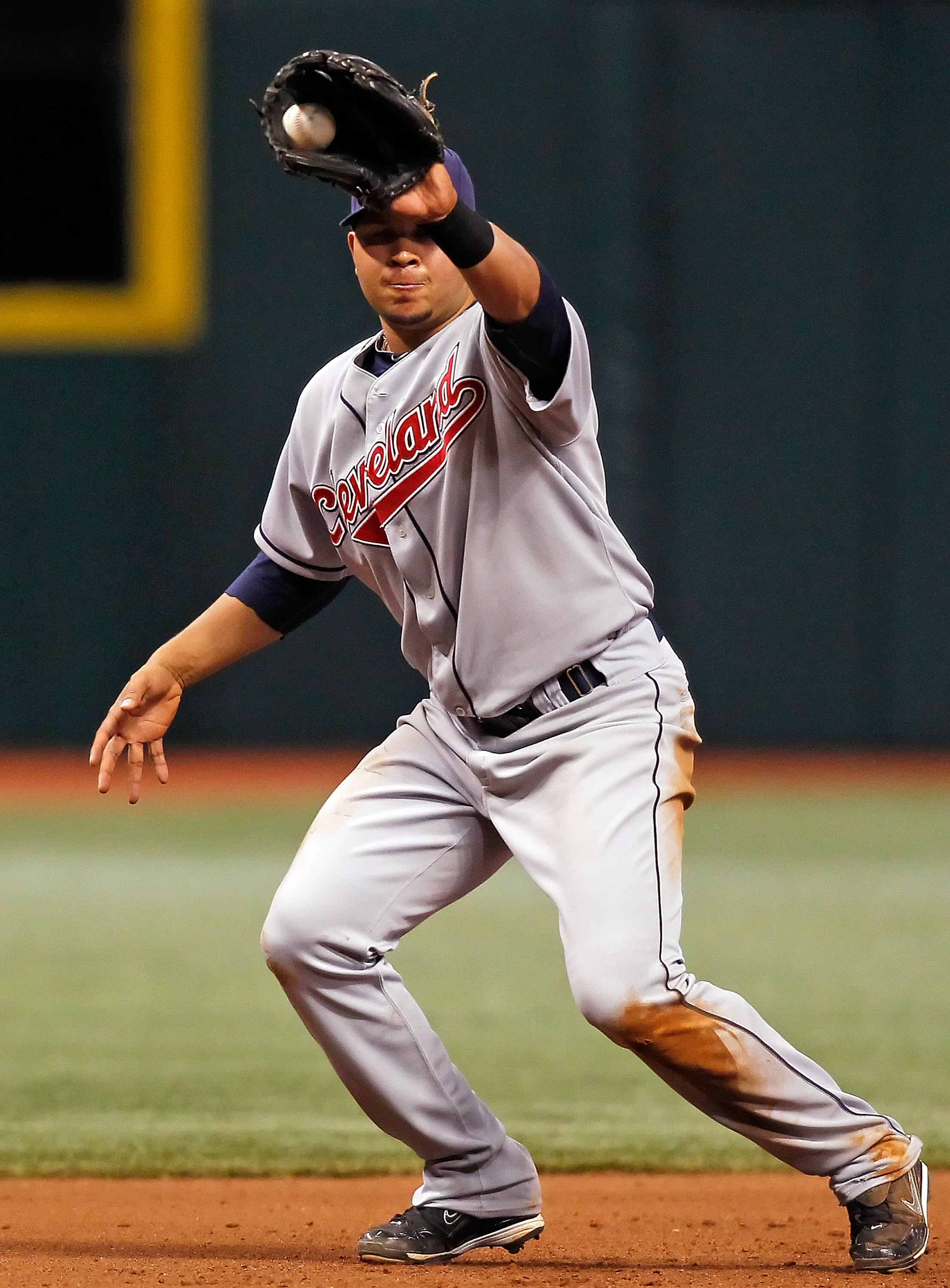 ST PETERSBURG, FL - MAY 17:  Infielder Jhonny Peralta #2 of the Cleveland Indians catches a line drive at third against the Tampa Bay Rays during the game at Tropicana Field on May 17, 2010 in St. Petersburg, Florida.  (Photo by J. Meric/Getty Images)