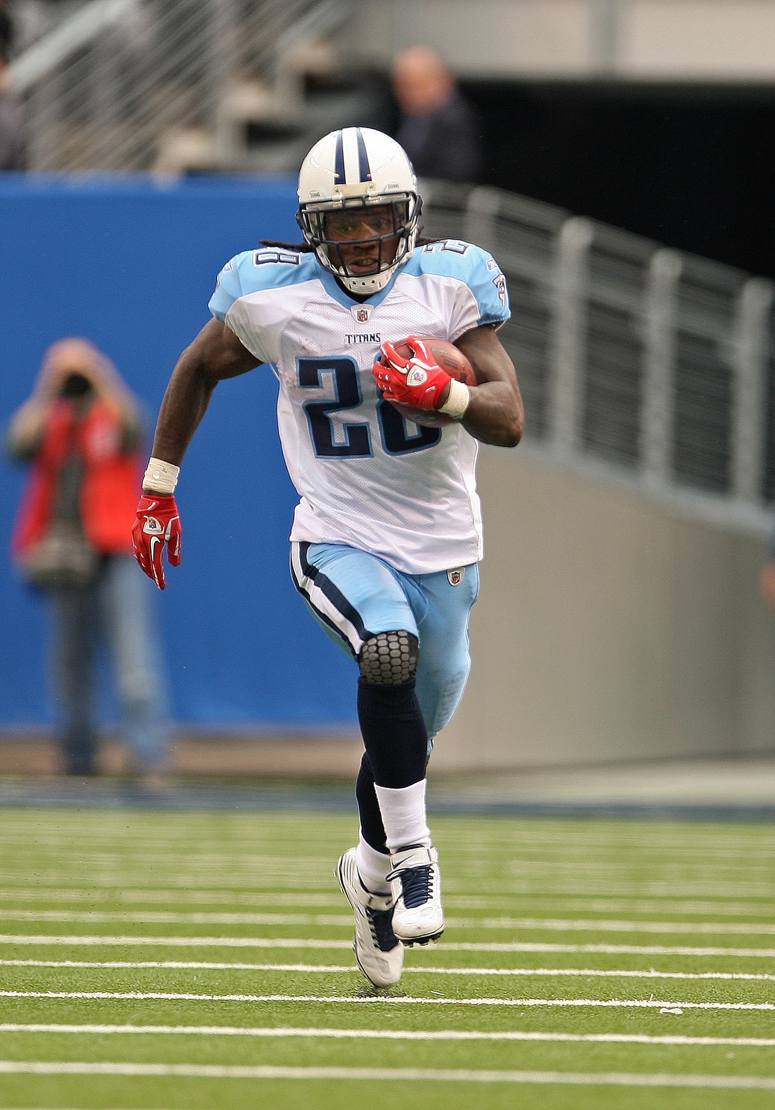 EAST RUTHERFORD, NJ - SEPTEMBER 26:  Chris Johnson #28 of the Tennessee Titans breaks for a long run during a game against the New York Giants at New Meadowlands Stadium on September 26, 2010 in East Rutherford, New Jersey.  (Photo by Mike Ehrmann/Getty I