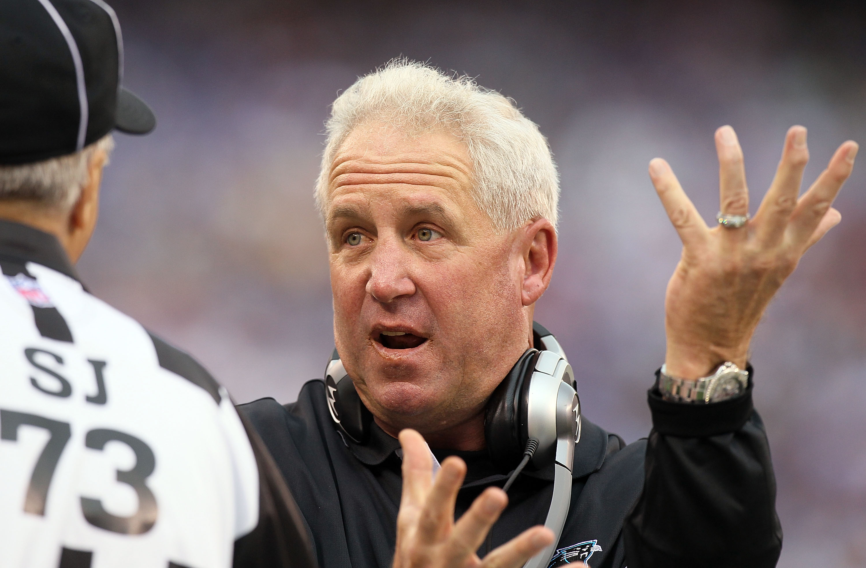 EAST RUTHERFORD, NJ - SEPTEMBER 12: Head coach John Fox of the Carolina Panthers argues a call with side judge Joe Larrew after a play against the New York Giants on September 12, 2010 at the New Meadowlands Stadium in East Rutherford, New Jersey.  (Photo