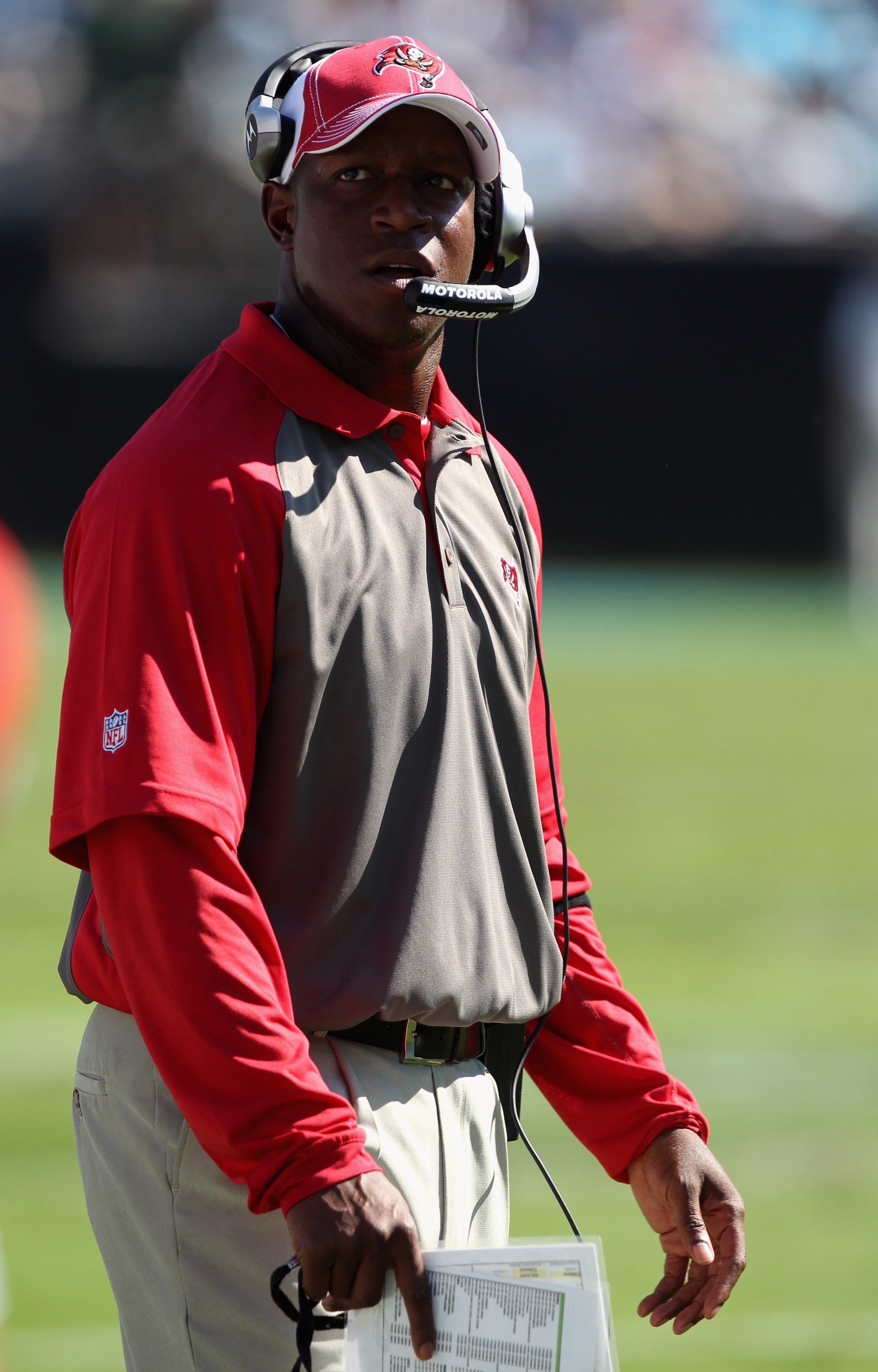 CHARLOTTE, NC - SEPTEMBER 19:  Head coach Raheem Morris of the Tampa Bay Buccaneers looks on against the Carolina Panthers during their game at Bank of America Stadium on September 19, 2010 in Charlotte, North Carolina.  (Photo by Streeter Lecka/Getty Ima