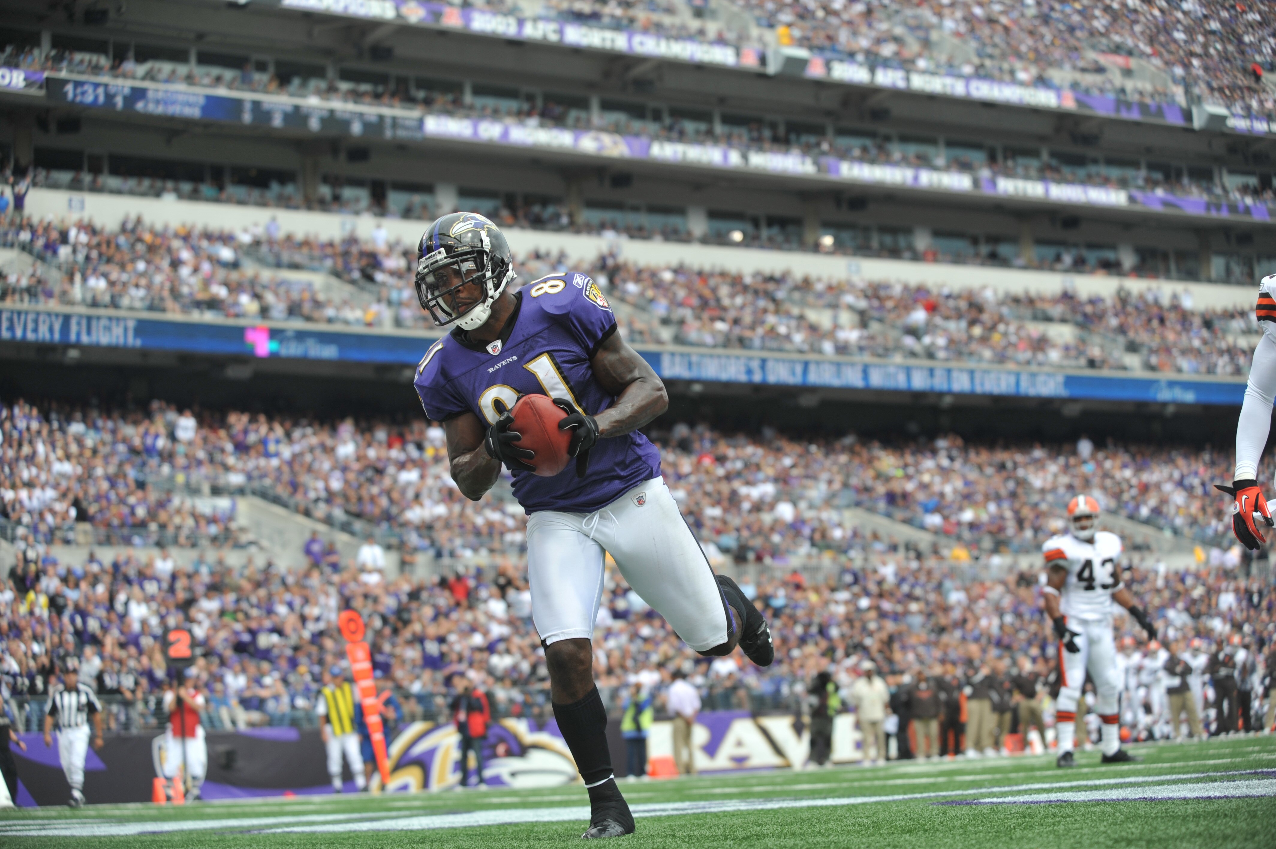 BALTIMORE - SEPTEMBER 26:  Anquan Boldin #81 of the Baltimore Ravens scores a touchdown against the Cleveland Browns  at M&T Bank Stadium on September 26, 2010 in Baltimore, Maryland. The Ravens lead the Browns at the half 14-10. (Photo by Larry French/Ge