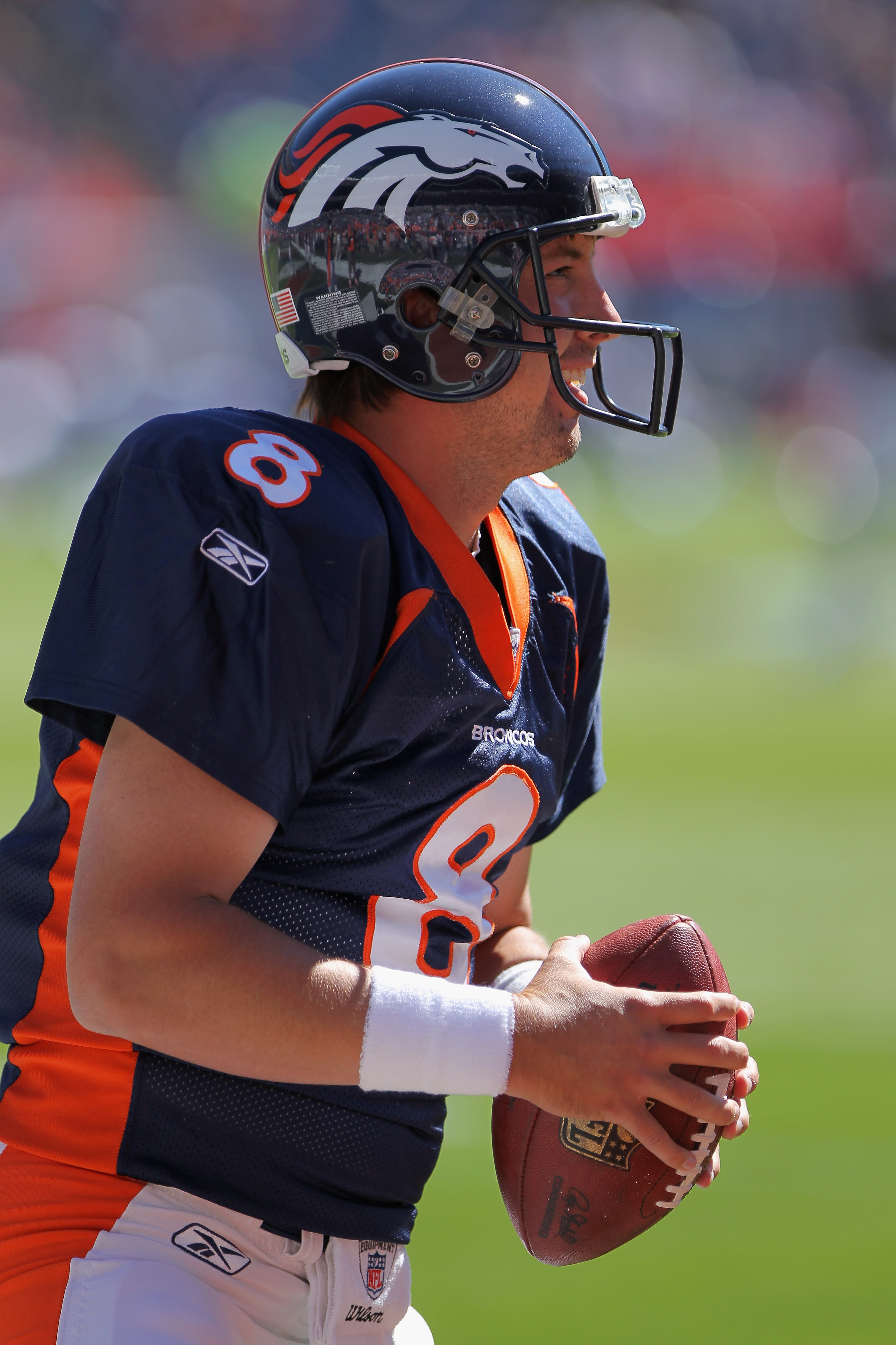 DENVER - SEPTEMBER 26:  Quarterback Kyle Orton #8 of the Denver Broncos warms up prior to facing the Indianapolis Colts at INVESCO Field at Mile High on September 26, 2010 in Denver, Colorado. Orton passed for 476 yards as the Colts defeated the Broncos 2