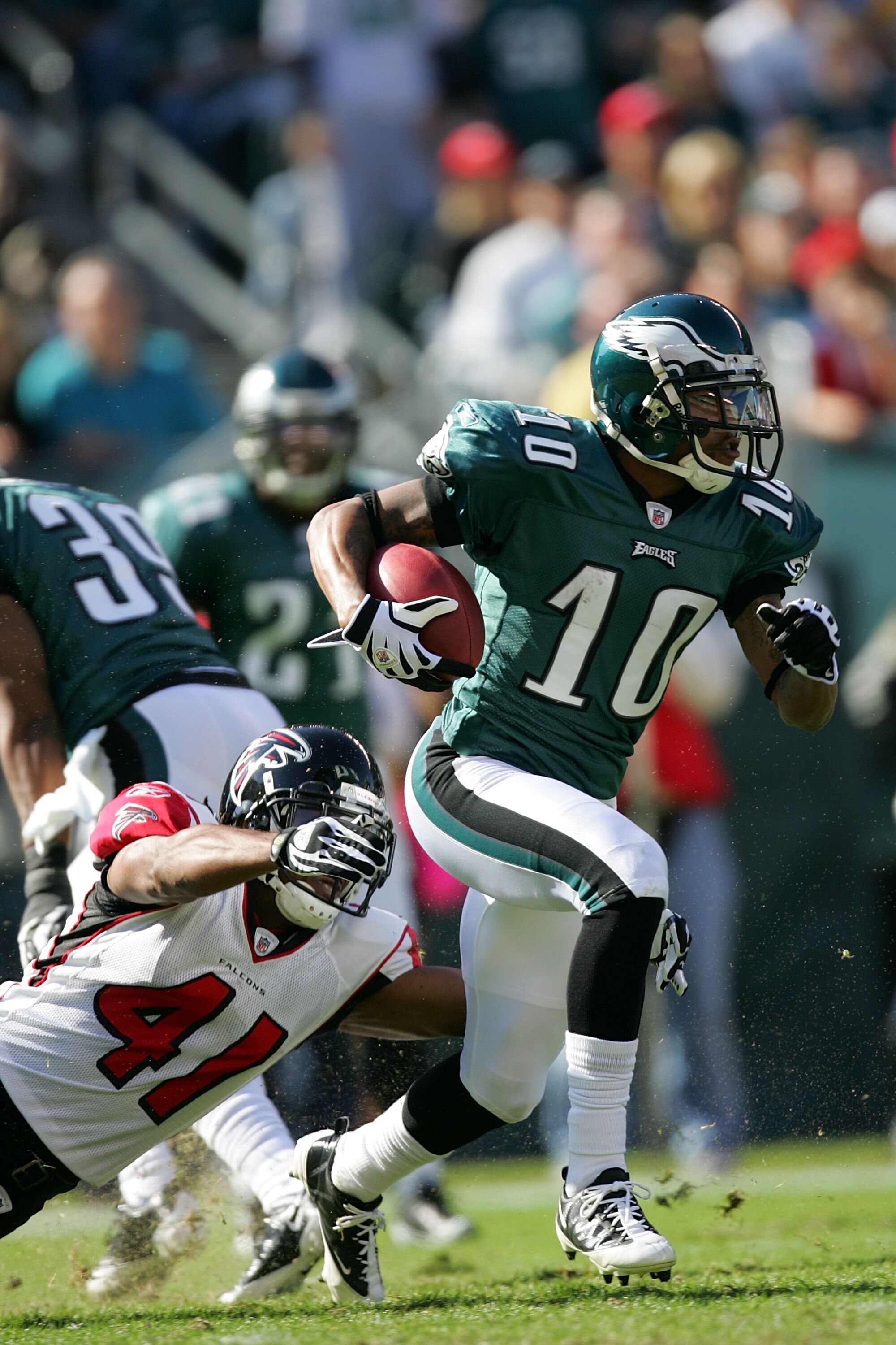 PHILADELPHIA - OCTOBER 26: DeSean Jackson #10 of the Philadelphia Eagles is tackled by Antoine Harris #31 of the Atlanta Falcons on October 26, 2008 at Lincoln Financial Field in Philadelphia, Pennsylvania. The Eagles defeated the Falcons 27-14.  (Photo b