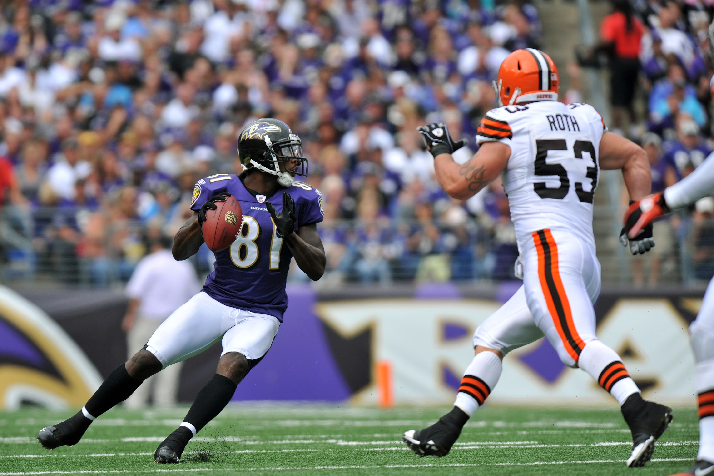 BALTIMORE - SEPTEMBER 26:  Anquan Boldin #81 of the Baltimore Ravens passes against the Cleveland Browns  at M&T Bank Stadium on September 26, 2010 in Baltimore, Maryland. The Ravens defeated the Browns 24-17. (Photo by Larry French/Getty Images)