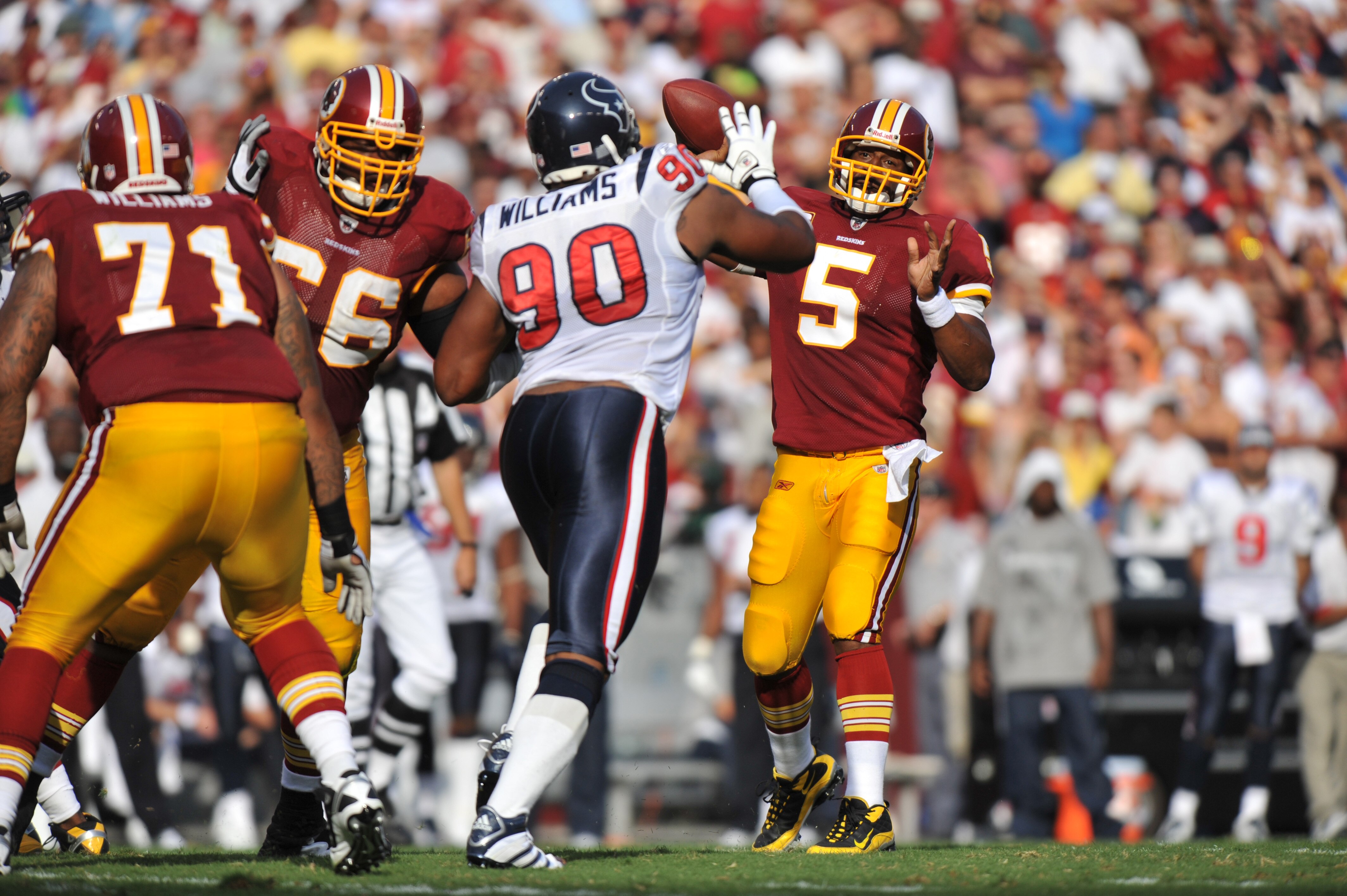 LANDOVER, MD - SEPTEMBER 19:  Donovan McNabb #5 of the Washington Redskins passes against the Houston Texans at FedExField on September 19, 2010 in Landover, Maryland. The Redskins lead the Texans at the half 20-7. (Photo by Larry French/Getty Images)