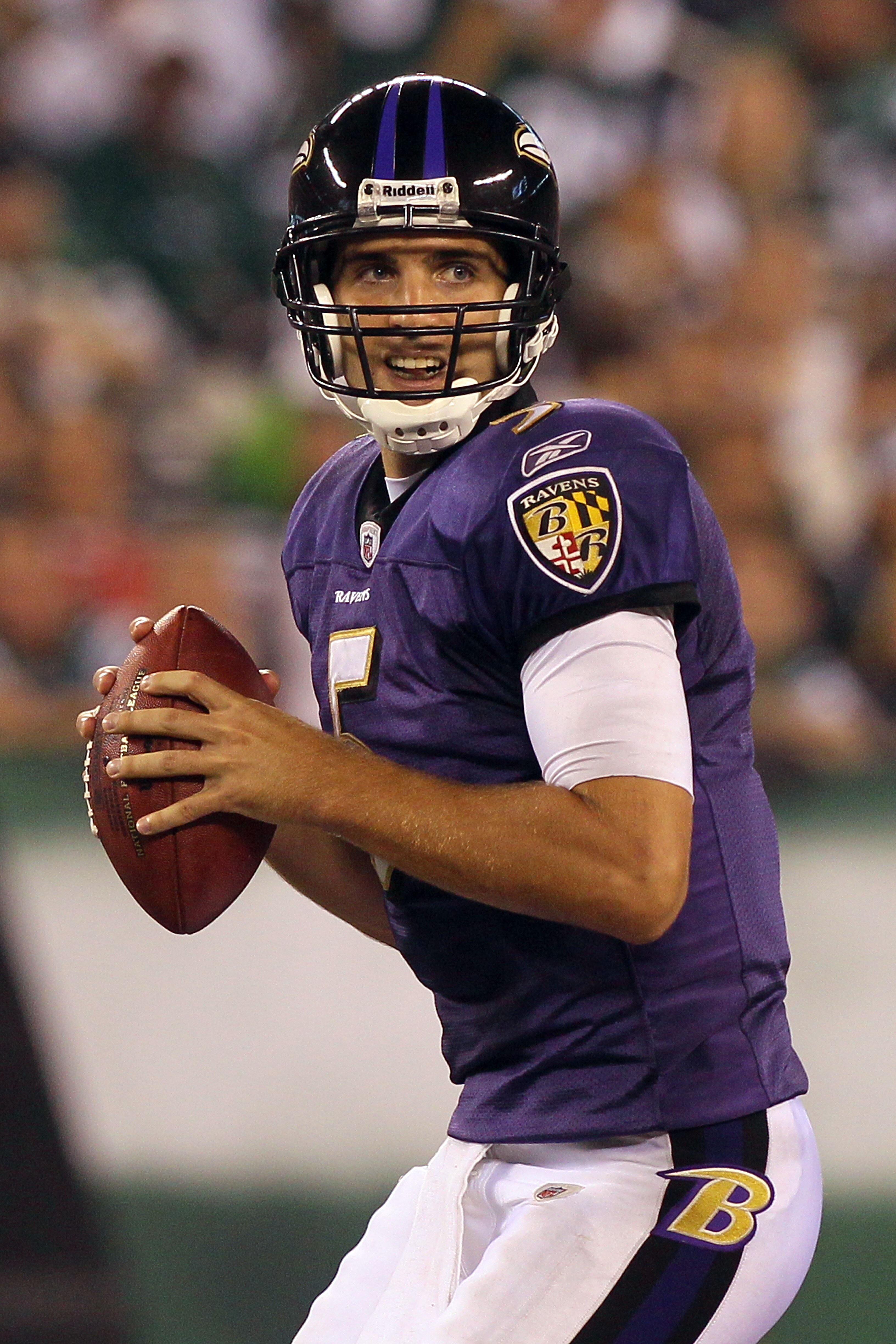 EAST RUTHERFORD, NJ - SEPTEMBER 13:  Joe Flacco #5 of the Baltimore Ravens looks to throws a pass against the New York Jets during the home opener at the New Meadowlands Stadium on September 13, 2010 in East Rutherford, New Jersey.  (Photo by Jim McIsaac/