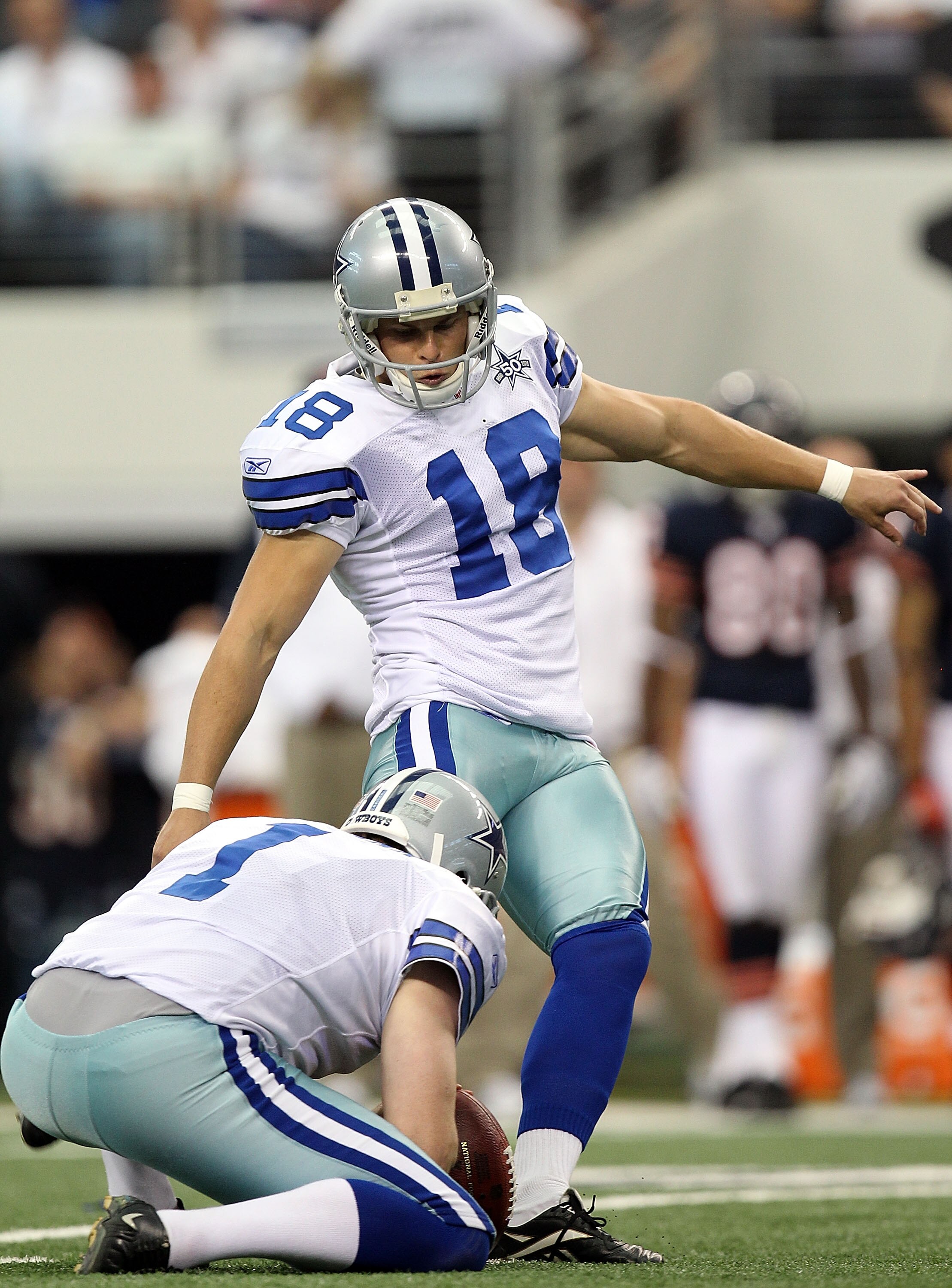ARLINGTON, TX - SEPTEMBER 19:  Kicker David Buehler #18 of the Dallas Cowboys at Cowboys Stadium on September 19, 2010 in Arlington, Texas.  (Photo by Ronald Martinez/Getty Images)