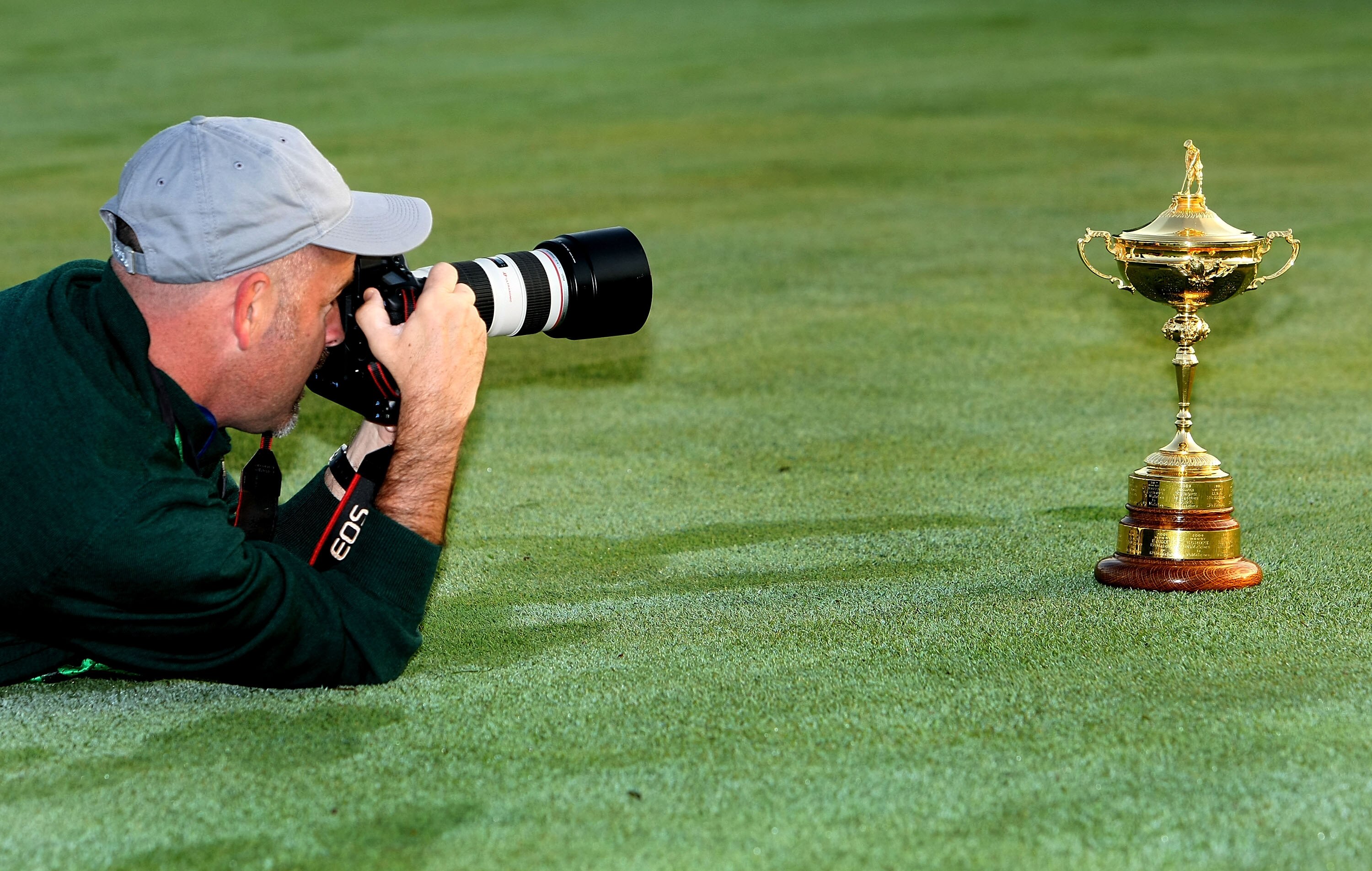 LOUISVILLE, KY - SEPTEMBER 16:  A photographer takes a close up picture of the Ryder Cup during the European team photo shoot prior to the start of the 2008 Ryder Cup at Valhalla Golf Club on September 16, 2008 in Louisville, Kentucky.  (Photo by Harry Ho