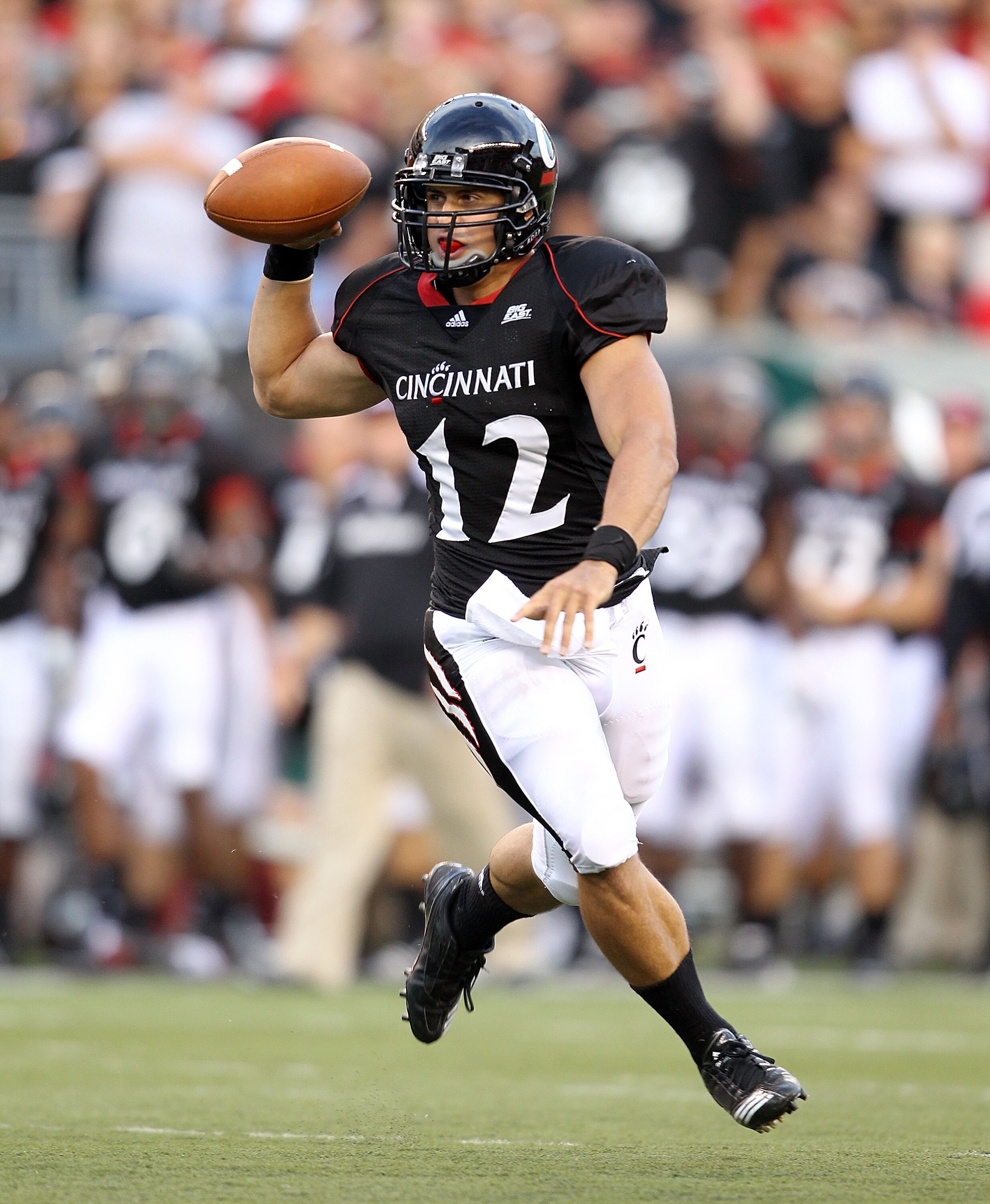 CINCINNATI - SEPTEMBER 25:  Zach Collaros #12 of  the Cincinnati Bearcats runs with the ball during the game against the Oklahoma Sooners at Paul Brown Stadium on September 25, 2010 in Cincinnati, Ohio.  (Photo by Andy Lyons/Getty Images)