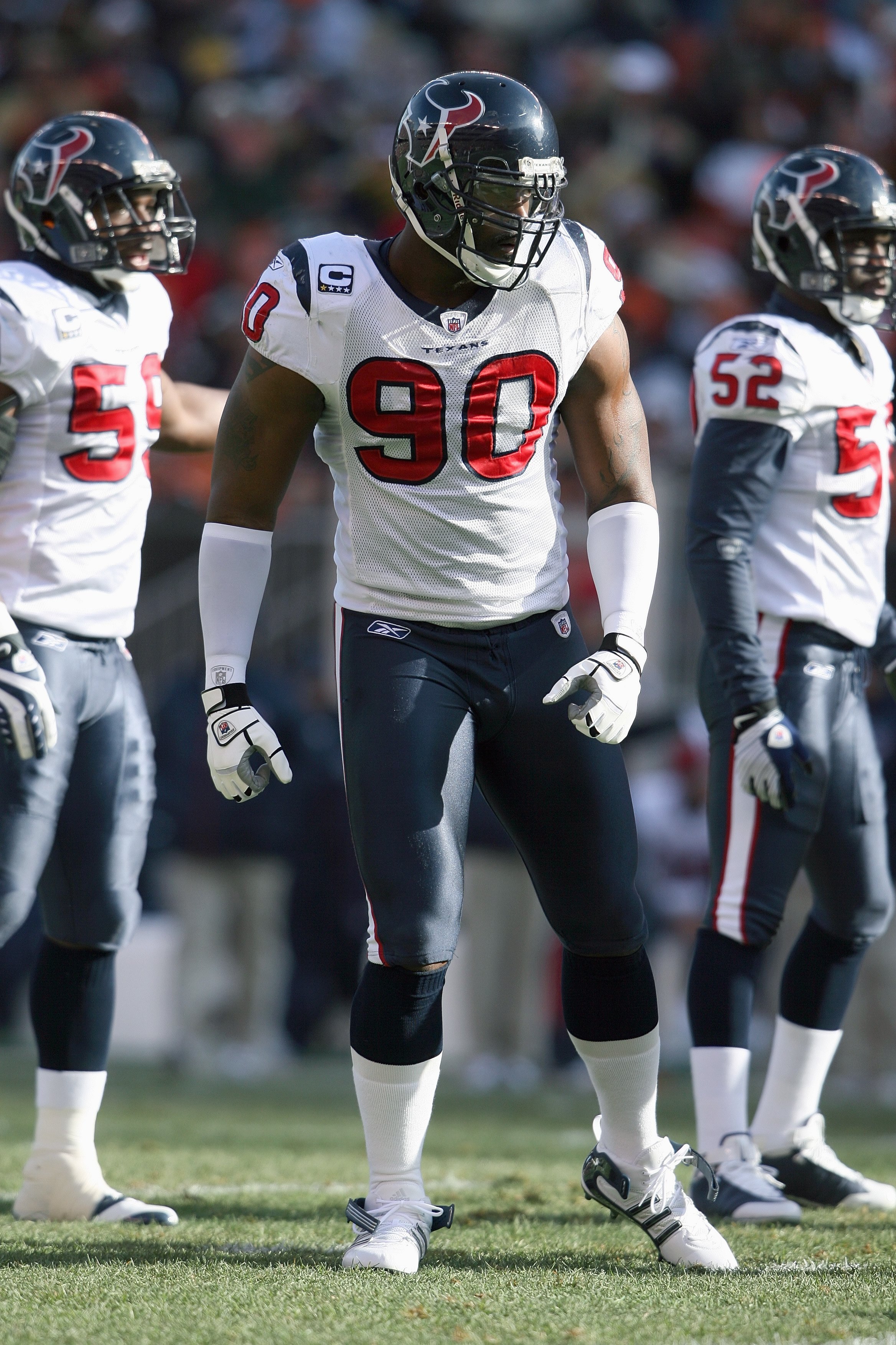 CLEVELAND - NOVEMBER 23:  Mario Williams #90  of the Houston Texans walks on the field during the NFL game against the Cleveland Browns at Cleveland Browns Stadium on November 23, 2008 in Cleveland, Ohio.  (Photo by Andy Lyons/Getty Images)