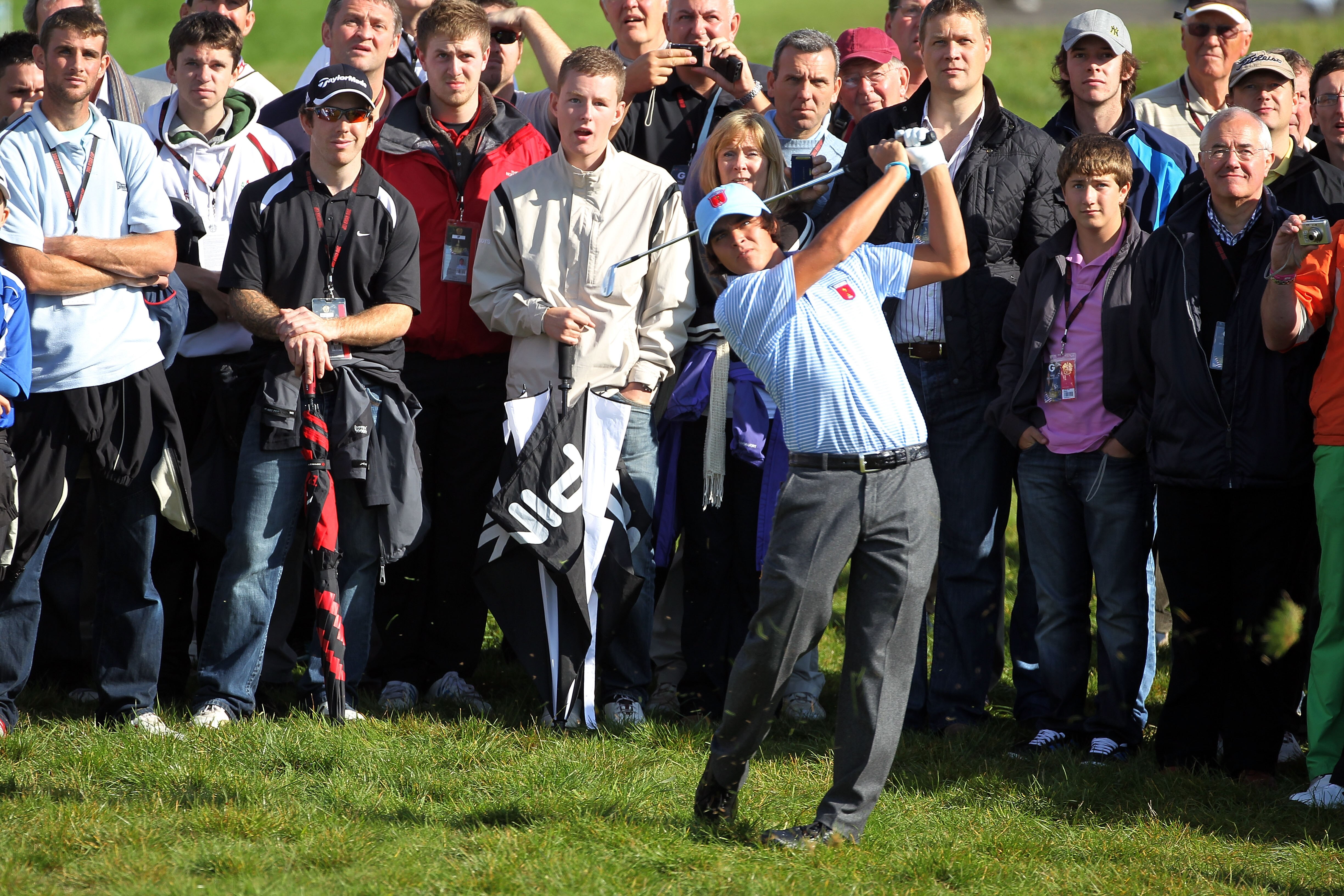NEWPORT, WALES - SEPTEMBER 28:  Rickie Fowler of the USA hits an approach shot during a practice round prior to the 2010 Ryder Cup at the Celtic Manor Resort on September 28, 2010 in Newport, Wales.  (Photo by Andy Lyons/Getty Images)