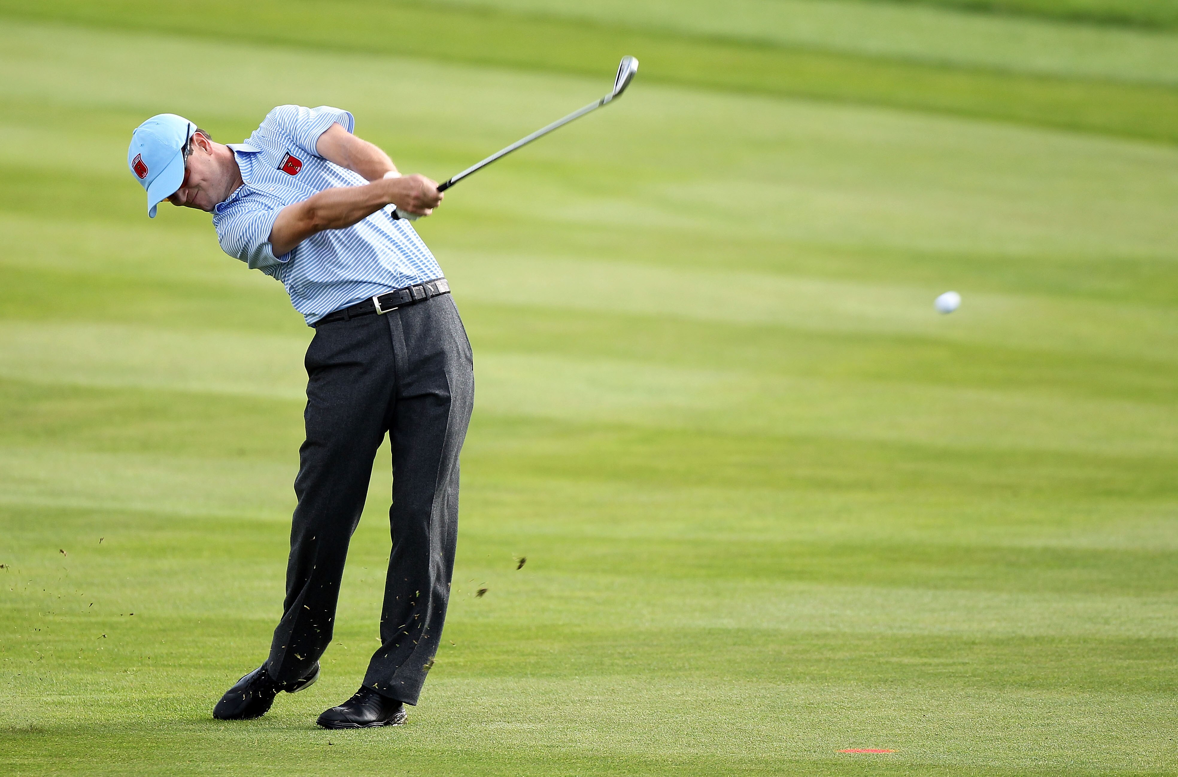 NEWPORT, WALES - SEPTEMBER 28:  Zach Johnson of the USA hits an approach shot during a practice round prior to the 2010 Ryder Cup at the Celtic Manor Resort on September 28, 2010 in Newport, Wales.  (Photo by Andy Lyons/Getty Images)