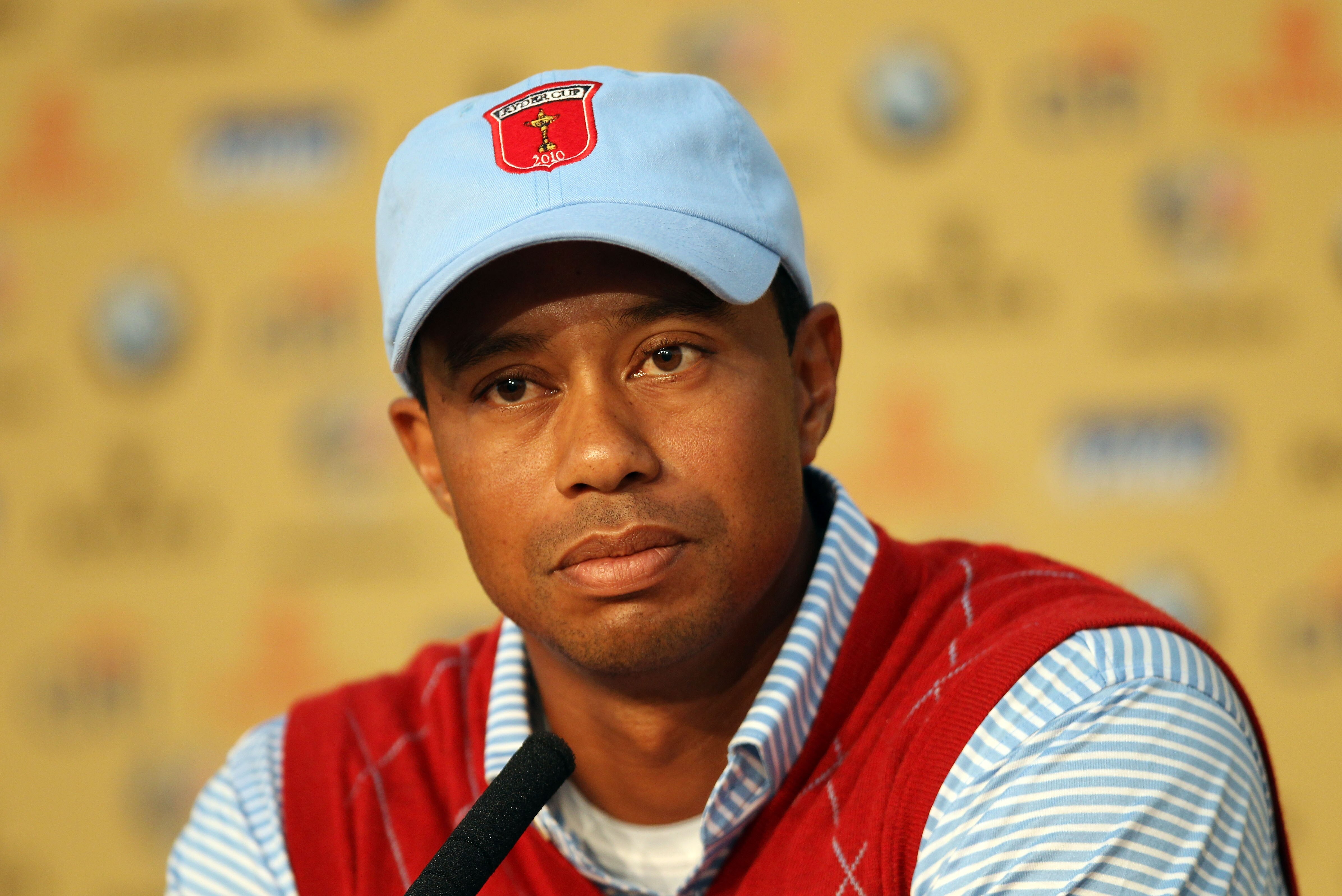 NEWPORT, WALES - SEPTEMBER 28:  Tiger Woods of the USA listens to questions from the media at a press conference following a practice round prior to the 2010 Ryder Cup at the Celtic Manor Resort on September 28, 2010 in Newport, Wales.  (Photo by Ross Kin