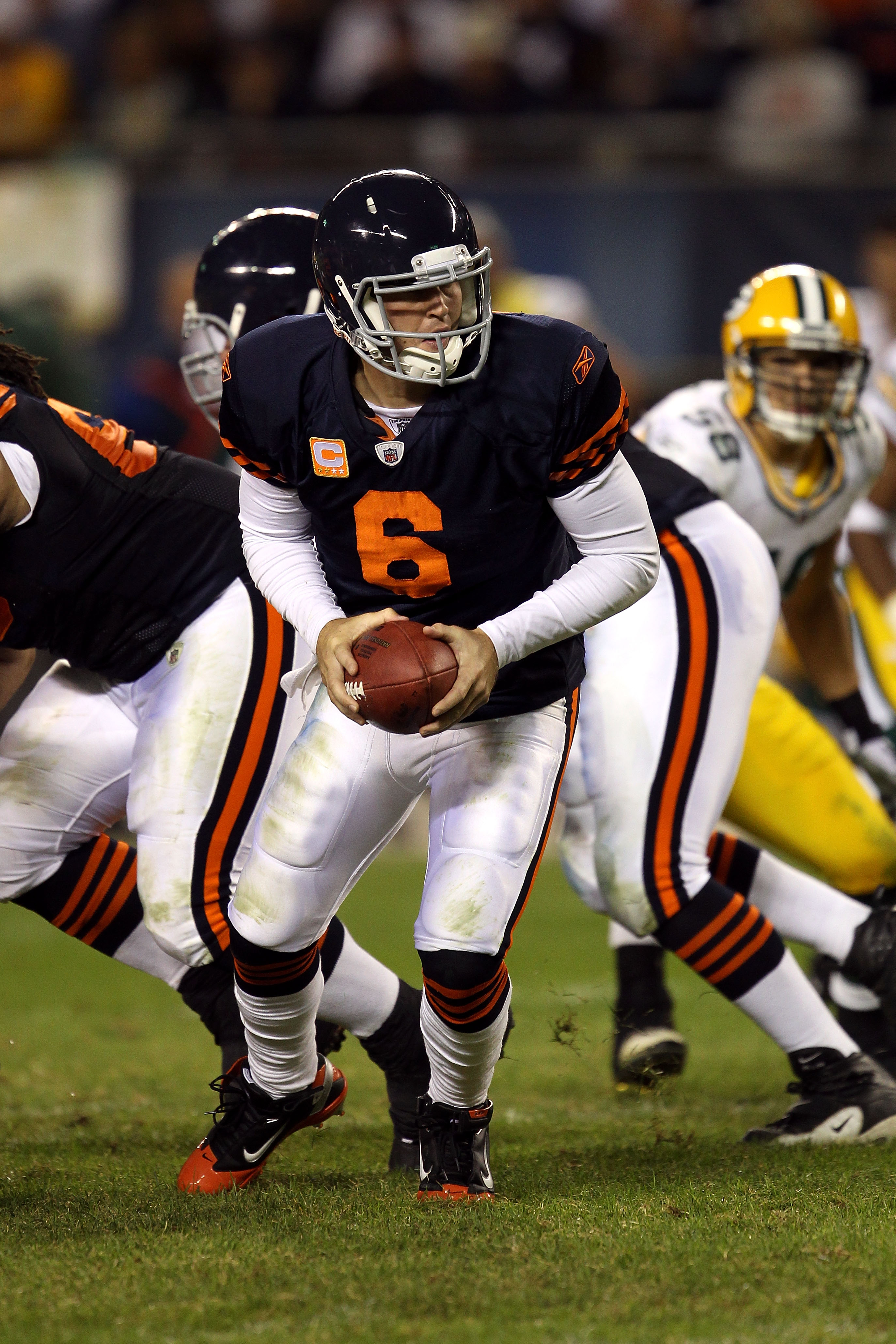 CHICAGO - SEPTEMBER 27:  Quarterback Jay Cutler #6 of the Chicago Bears turns to hand the ball off against the Green Bay Packers at Soldier Field on September 27, 2010 in Chicago, Illinois. The Bears won 20-17. (Photo by Jonathan Daniel/Getty Images)