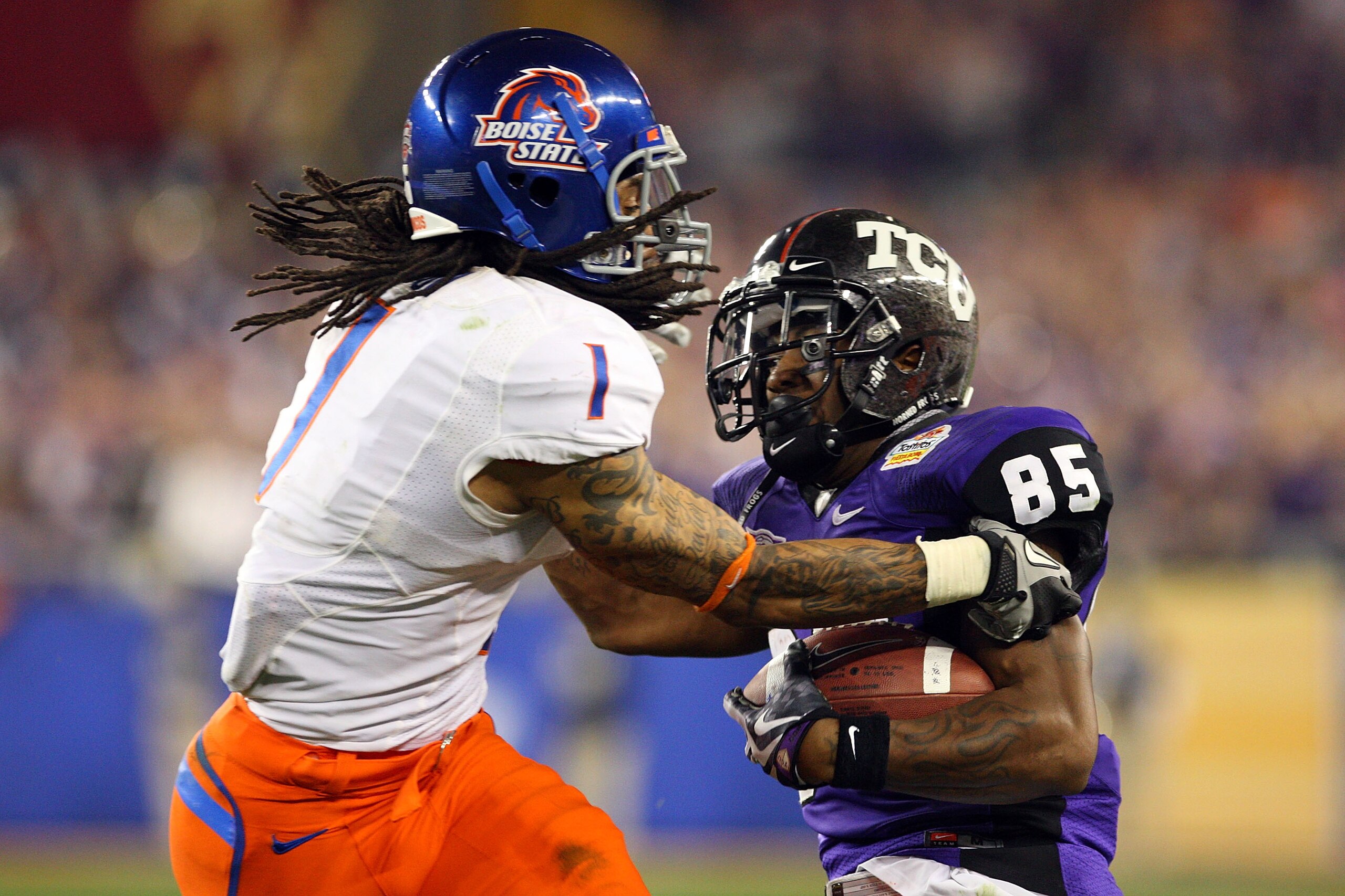 GLENDALE, AZ - JANUARY 04: Kyle Wilson #1 of the Boise State Broncos attempts to strip the ball from Jeremy Kerley #85 of the TCU Horned Frogs in the third quarter during the Tostitos Fiesta Bowl at the Universtity of Phoenix Stadium on January 4, 2010 i GLENDALE, AZ - JANUARY 04: Kyle Wilson #1 of the Boise State Broncos attempts to strip the ball from Jeremy Kerley #85 of the TCU Horned Frogs in the third quarter during the Tostitos Fiesta Bowl at the Universtity of Phoenix Stadium on January 4, 2010 i