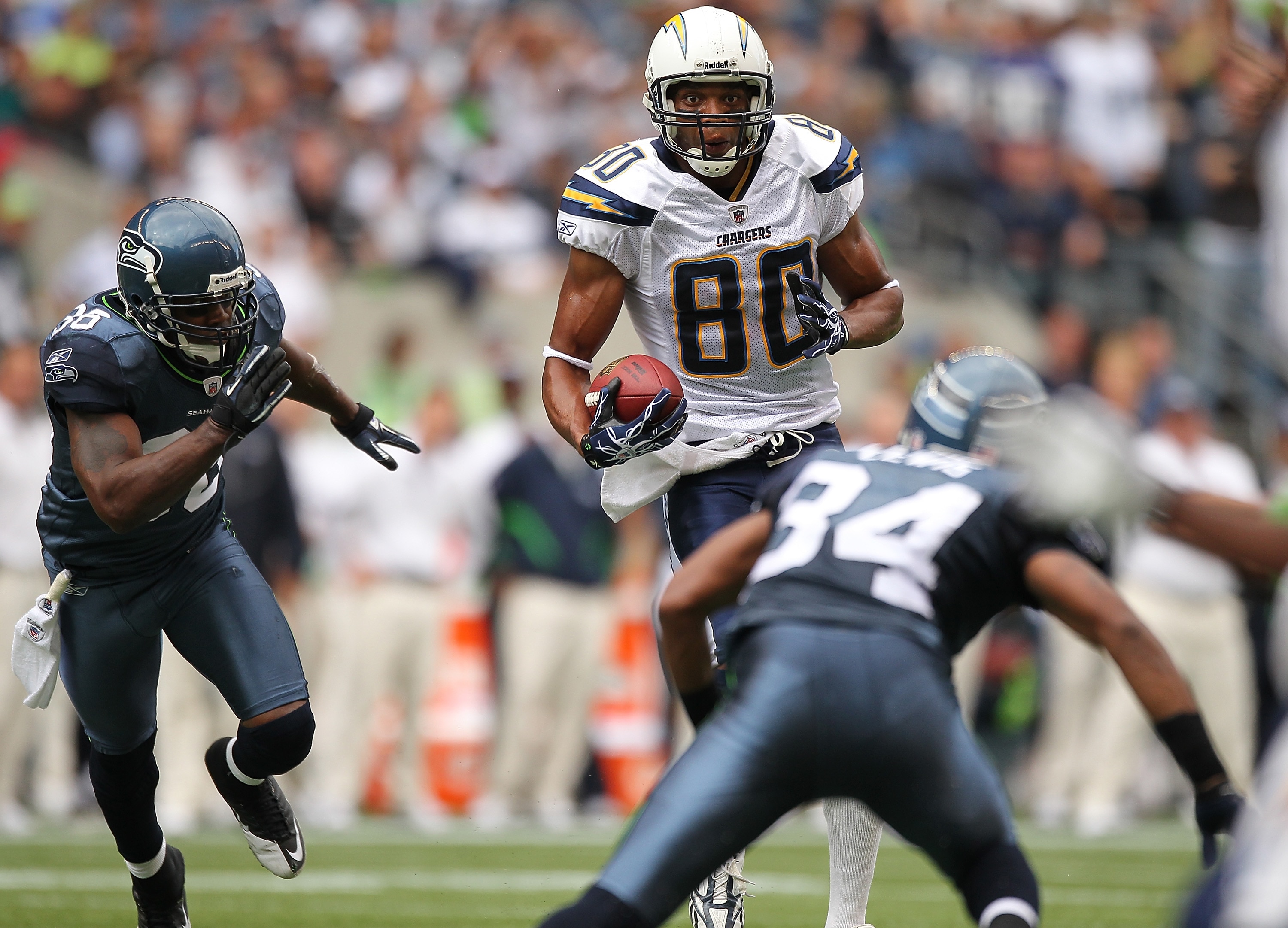 SEATTLE - SEPTEMBER 26:  Wide receiver Malcom Floyd #80 of the San Diego Chargers rushes against the Seattle Seahawks at Qwest Field on September 26, 2010 in Seattle, Washington. (Photo by Otto Greule Jr/Getty Images)