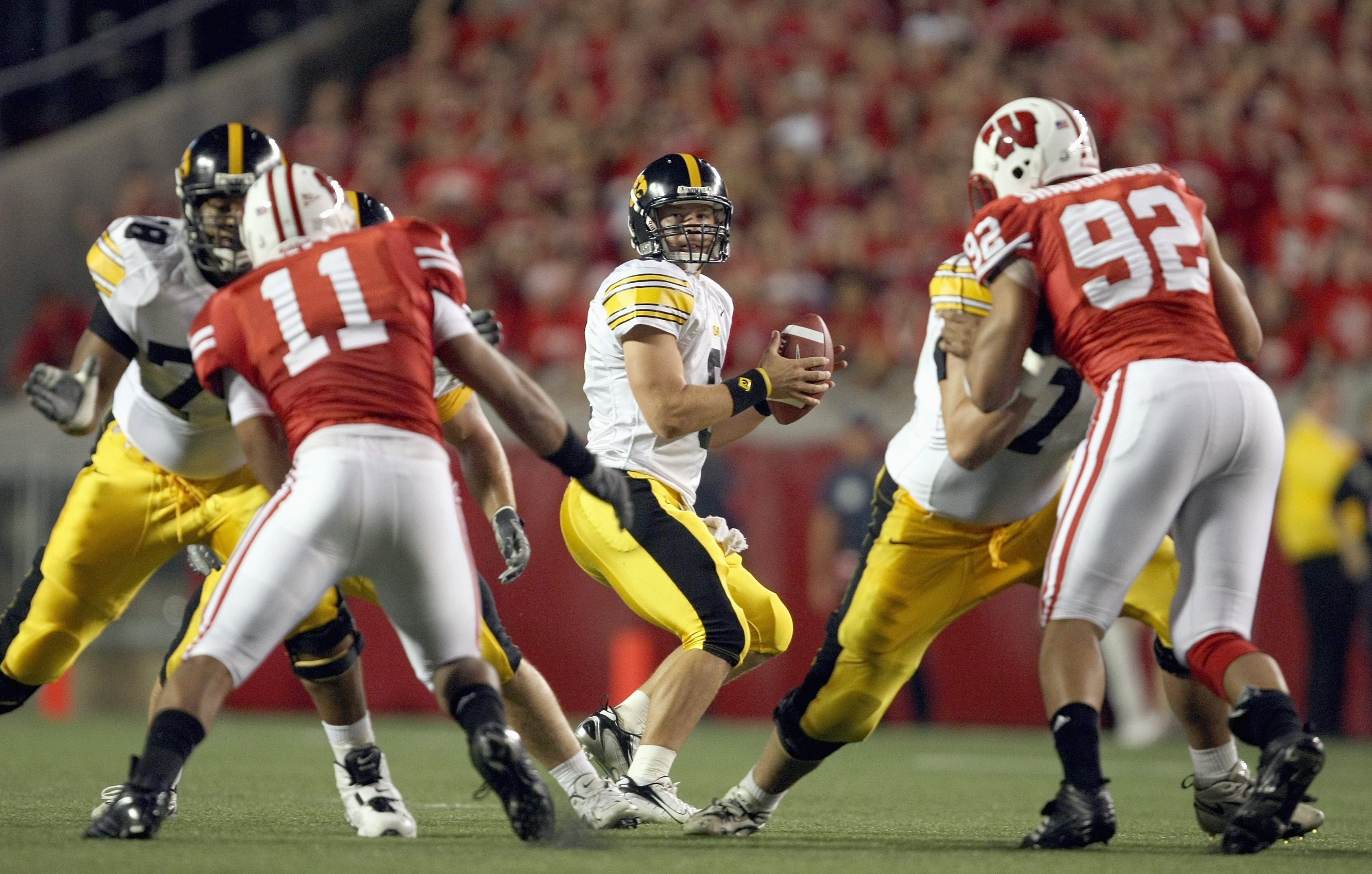 MADISON, WI - SEPTEMBER 22: Jake Christensen#6 of the Iowa Hawkeyes looks to pass the ball during the game against the Wisconsin Badgers at Camp Randall Stadium September 22, 2007 in Madison, Wisconsin. (Photo by Jonathan Daniel/Getty Images)