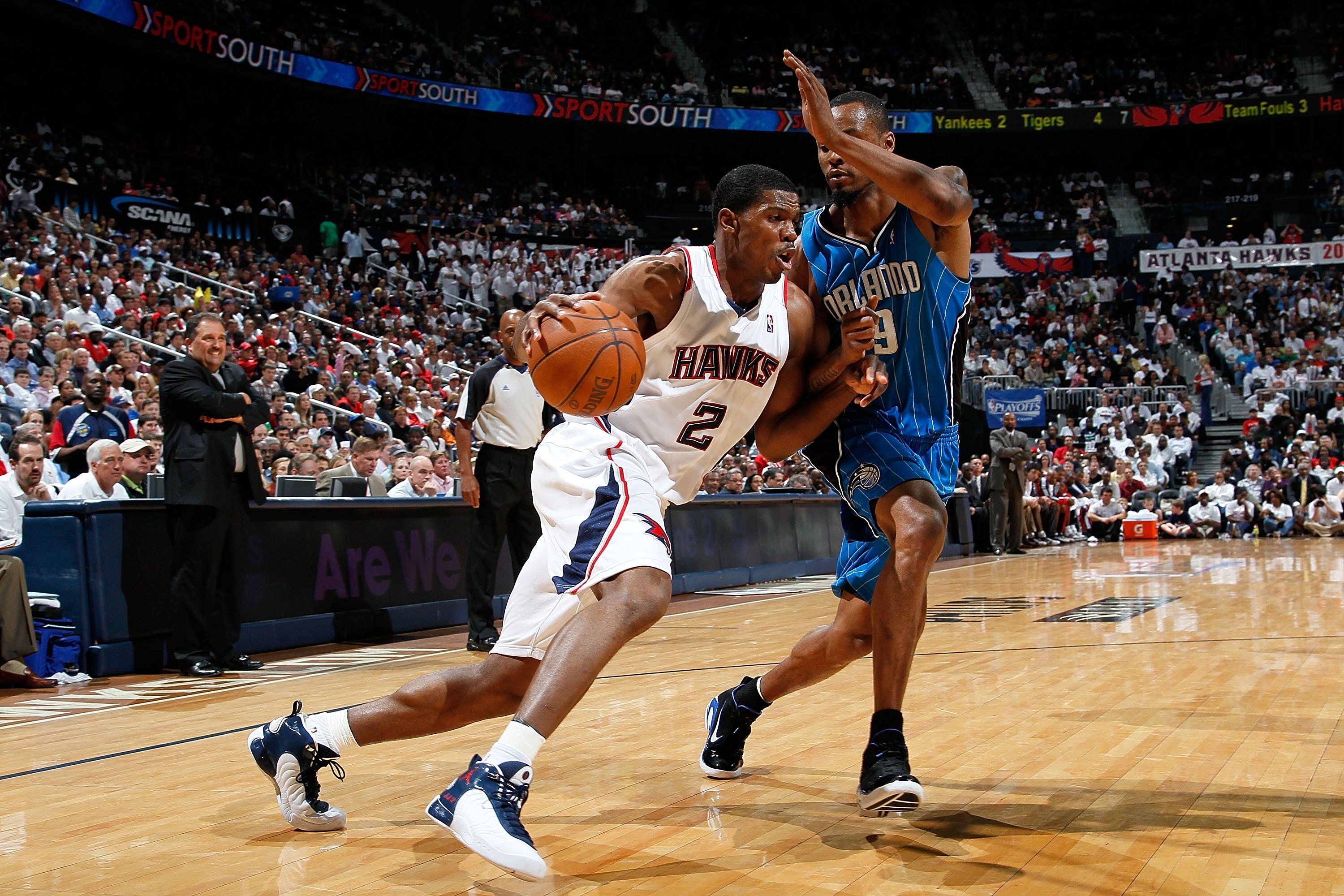 ATLANTA - MAY 10:  Joe Johnson #2 of the Atlanta Hawks against Rashard Lewis #9 of the Orlando Magic during Game Four of the Eastern Conference Semifinals of the 2010 NBA Playoffs at Philips Arena on May 10, 2010 in Atlanta, Georgia.  NOTE TO USER: User e